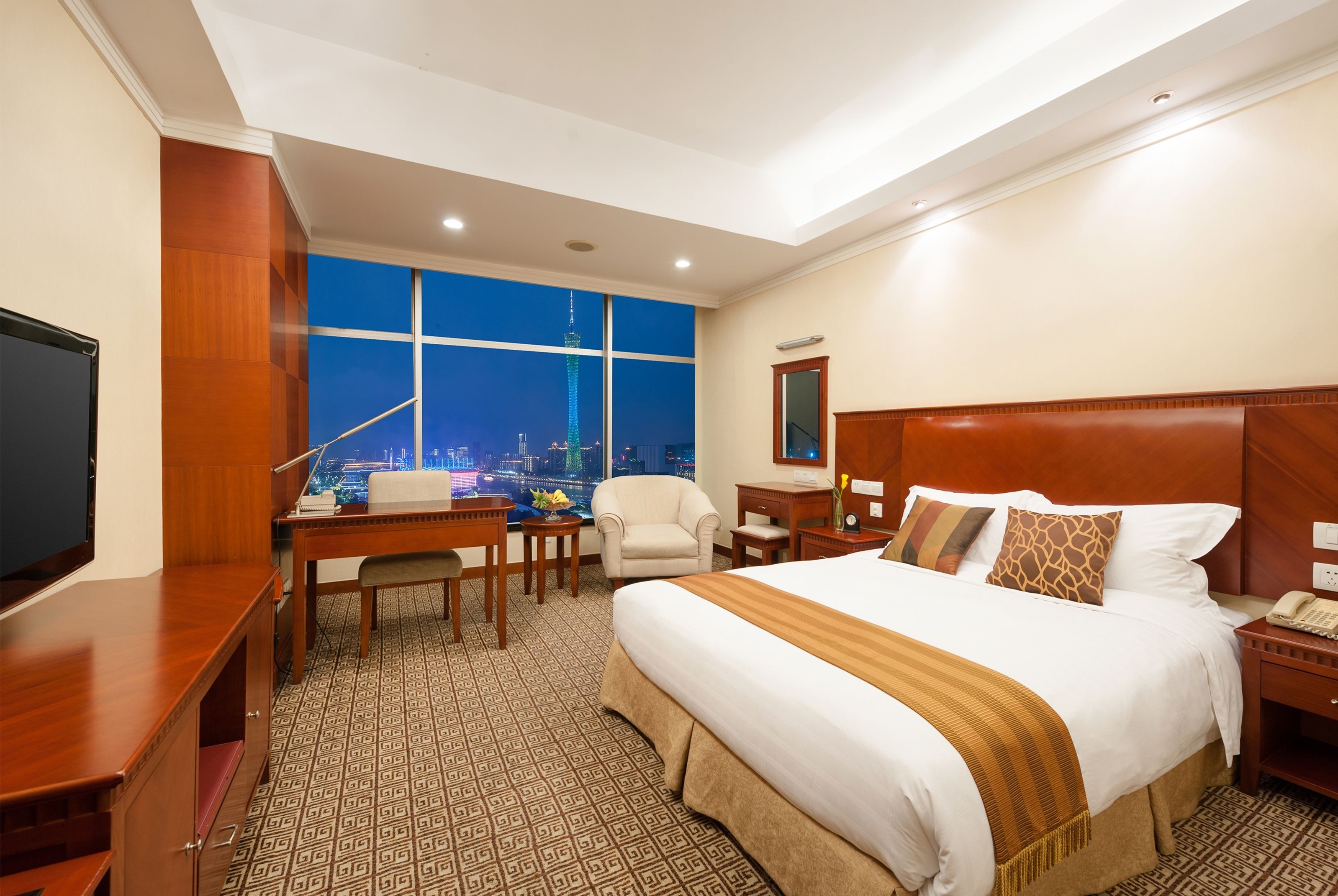 Guest room at the Ramada by Wyndham Pearl Guangzhou in Guangzhou, Other than US/Canada