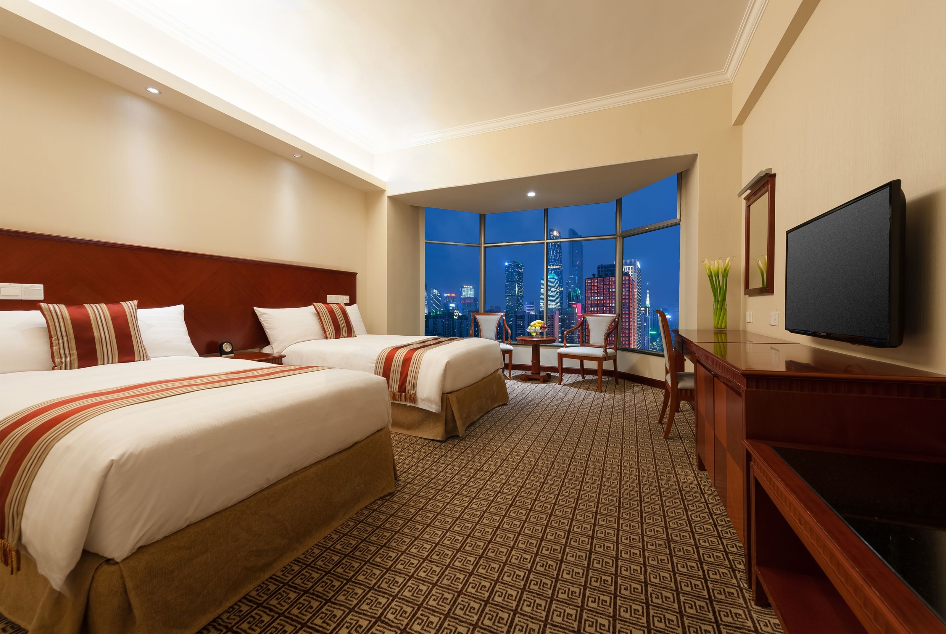 Guest room at the Ramada by Wyndham Pearl Guangzhou in Guangzhou, Other than US/Canada