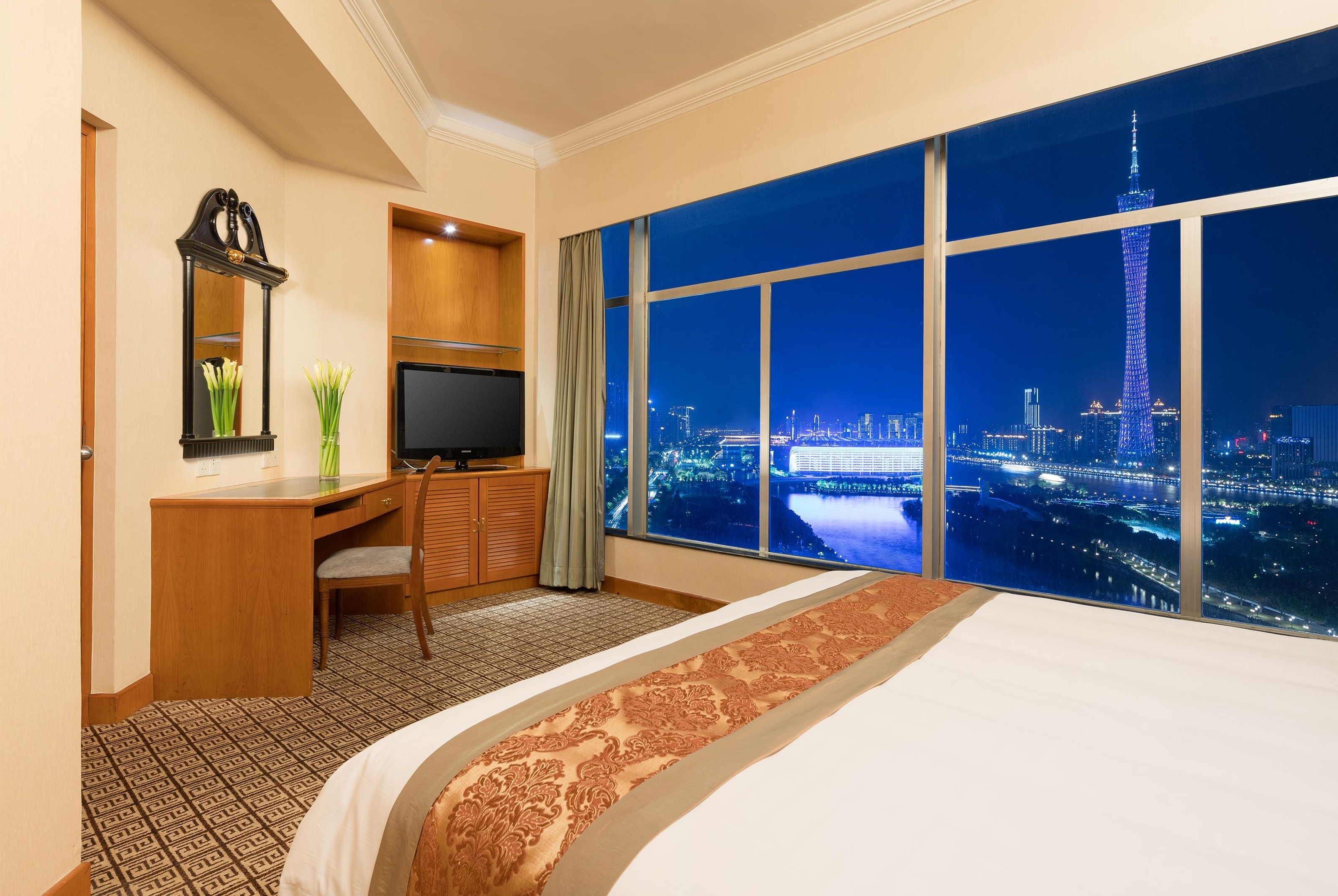 Guest room at the Ramada by Wyndham Pearl Guangzhou in Guangzhou, Other than US/Canada