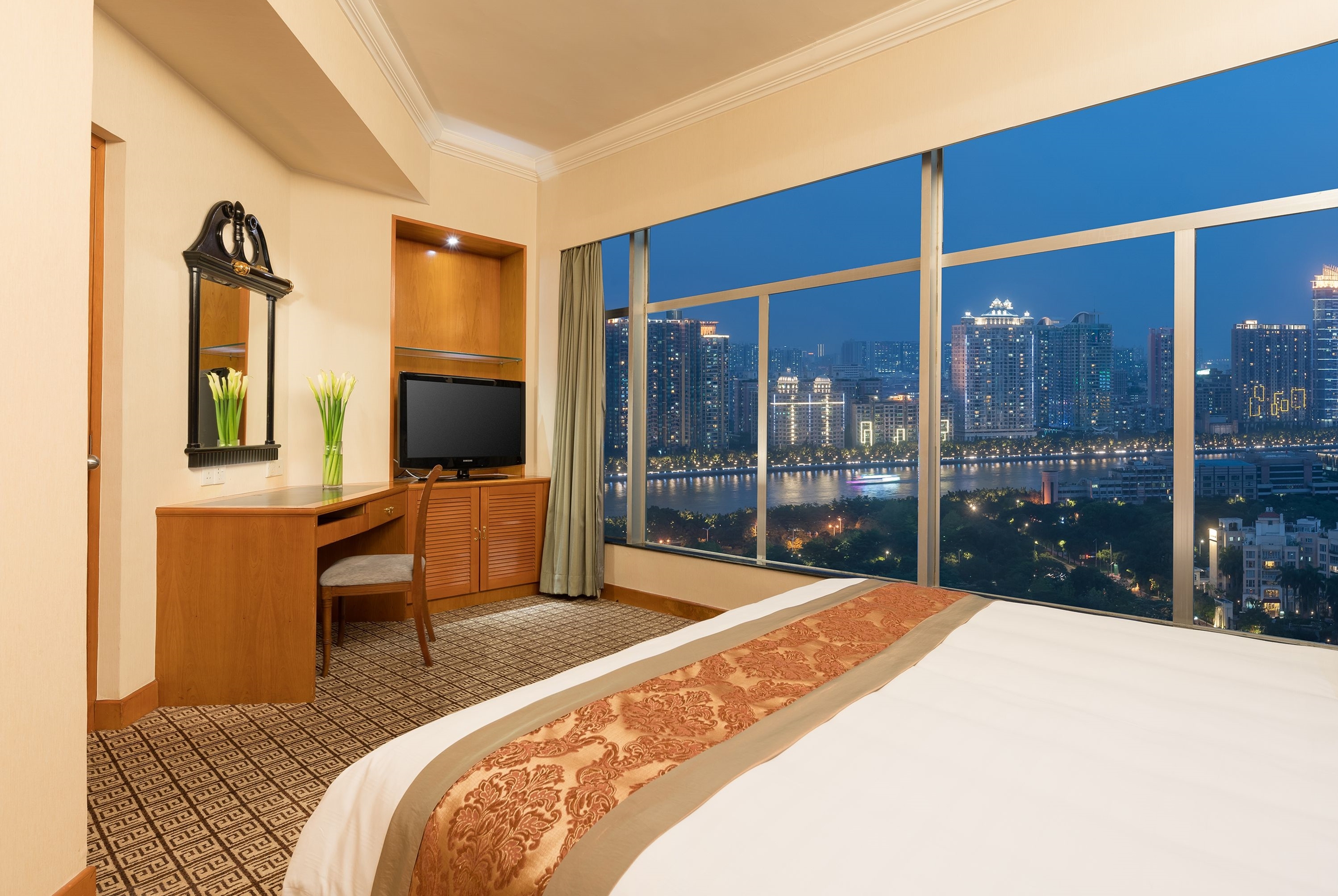Guest room at the Ramada by Wyndham Pearl Guangzhou in Guangzhou, Other than US/Canada