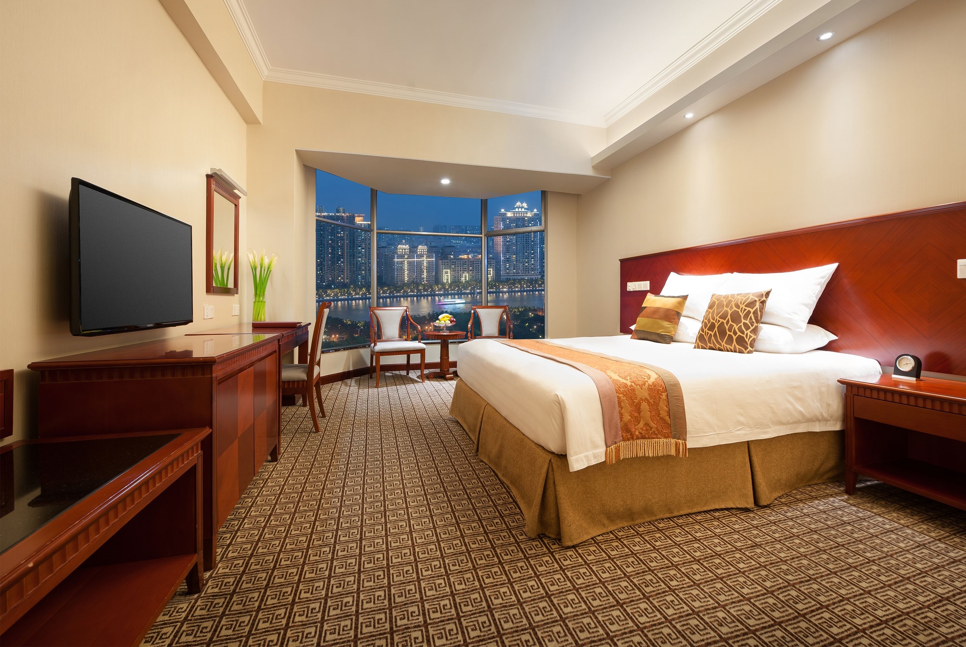 Guest room at the Ramada by Wyndham Pearl Guangzhou in Guangzhou, Other than US/Canada