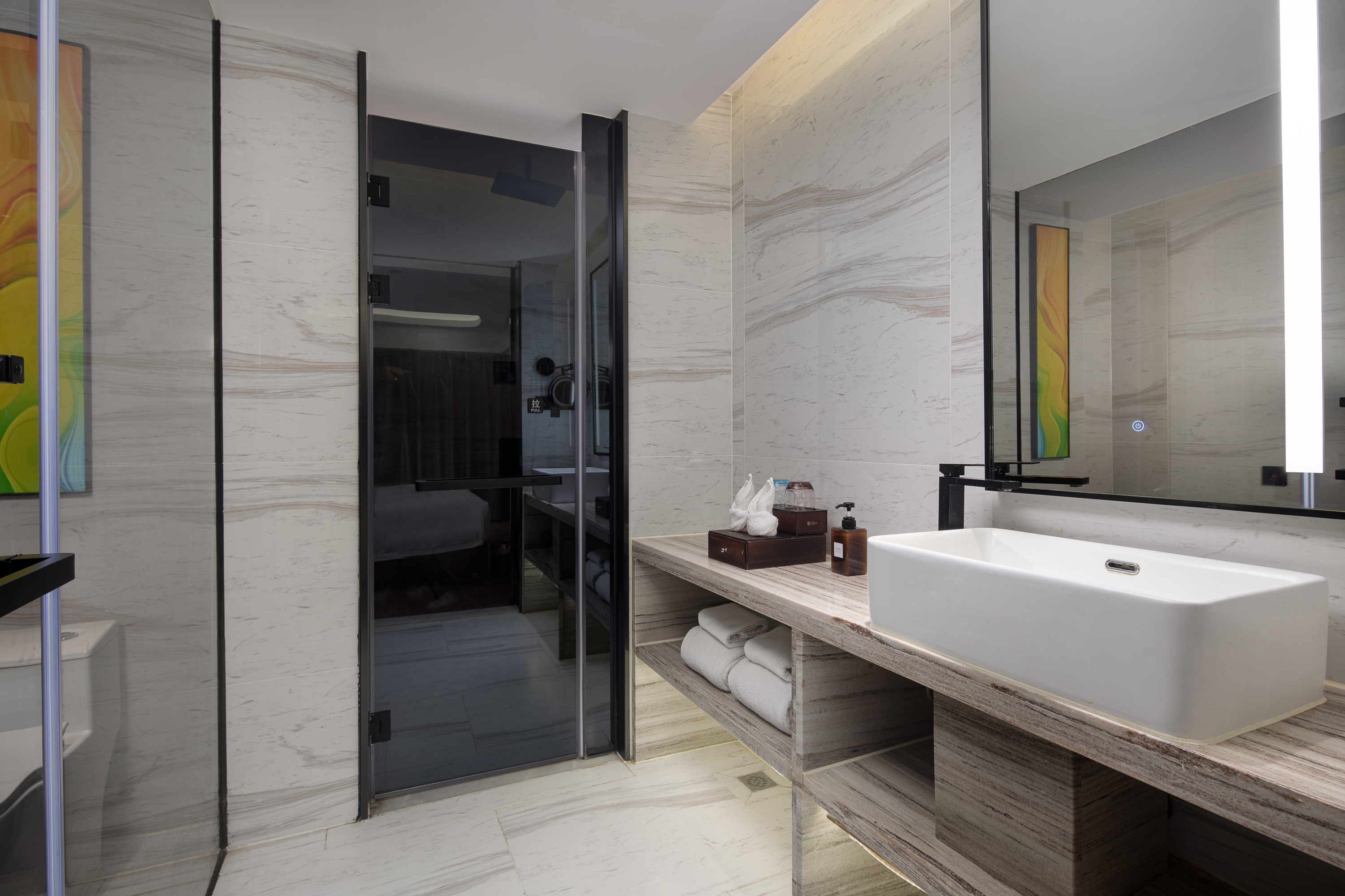 Guest room bath at the Ramada Encore by Wyndham Guangzhou Jiangnan West in Guangzhou, Other than US/Canada