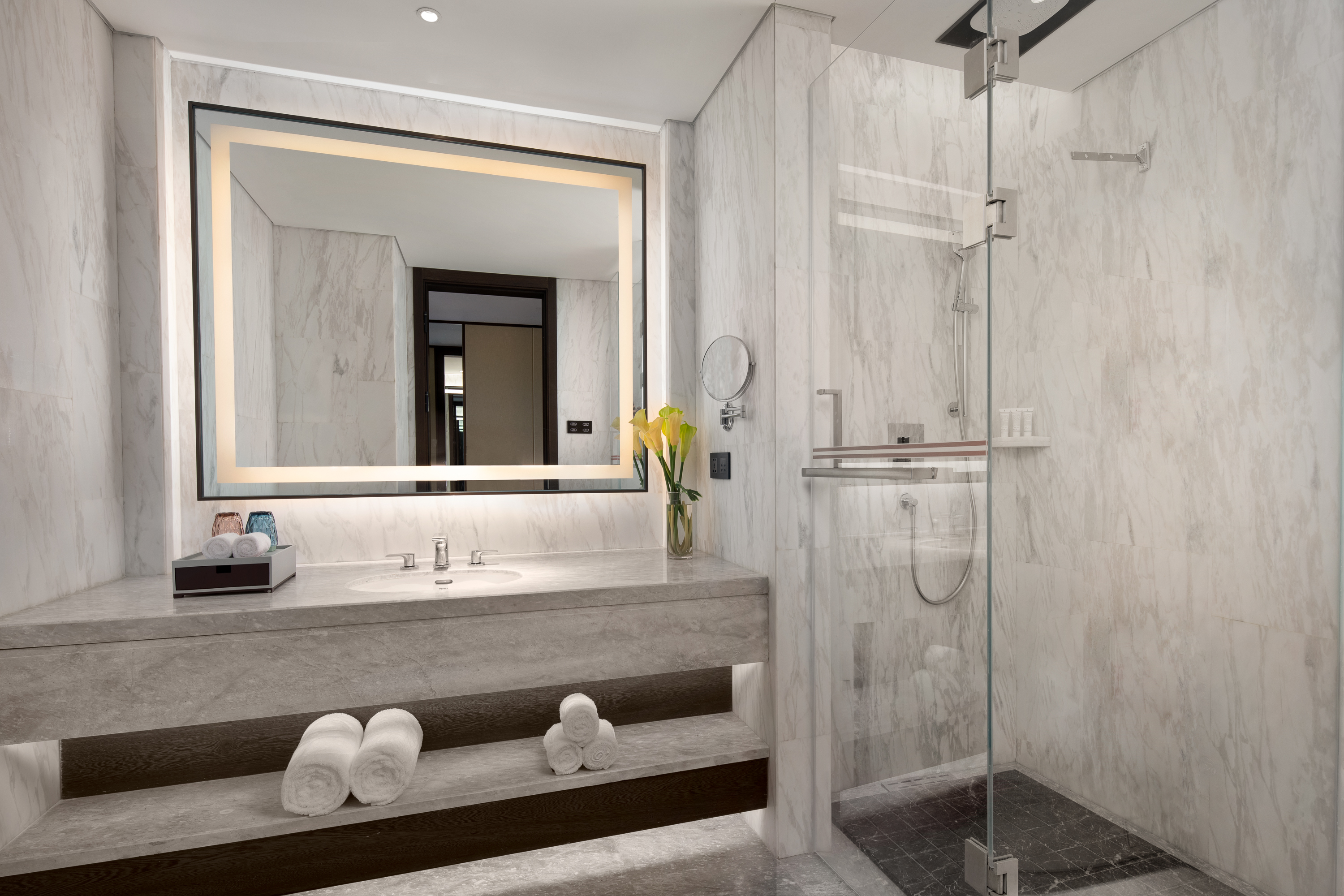 Guest room bath at the Ramada by Wyndham Yingshan Jiulongwan Resort in Huanggang, Other than US/Canada