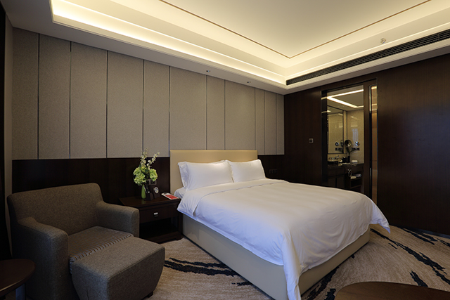 Guest room at the Ramada by Wyndham Huizhou South in Huizhou, Other than US/Canada