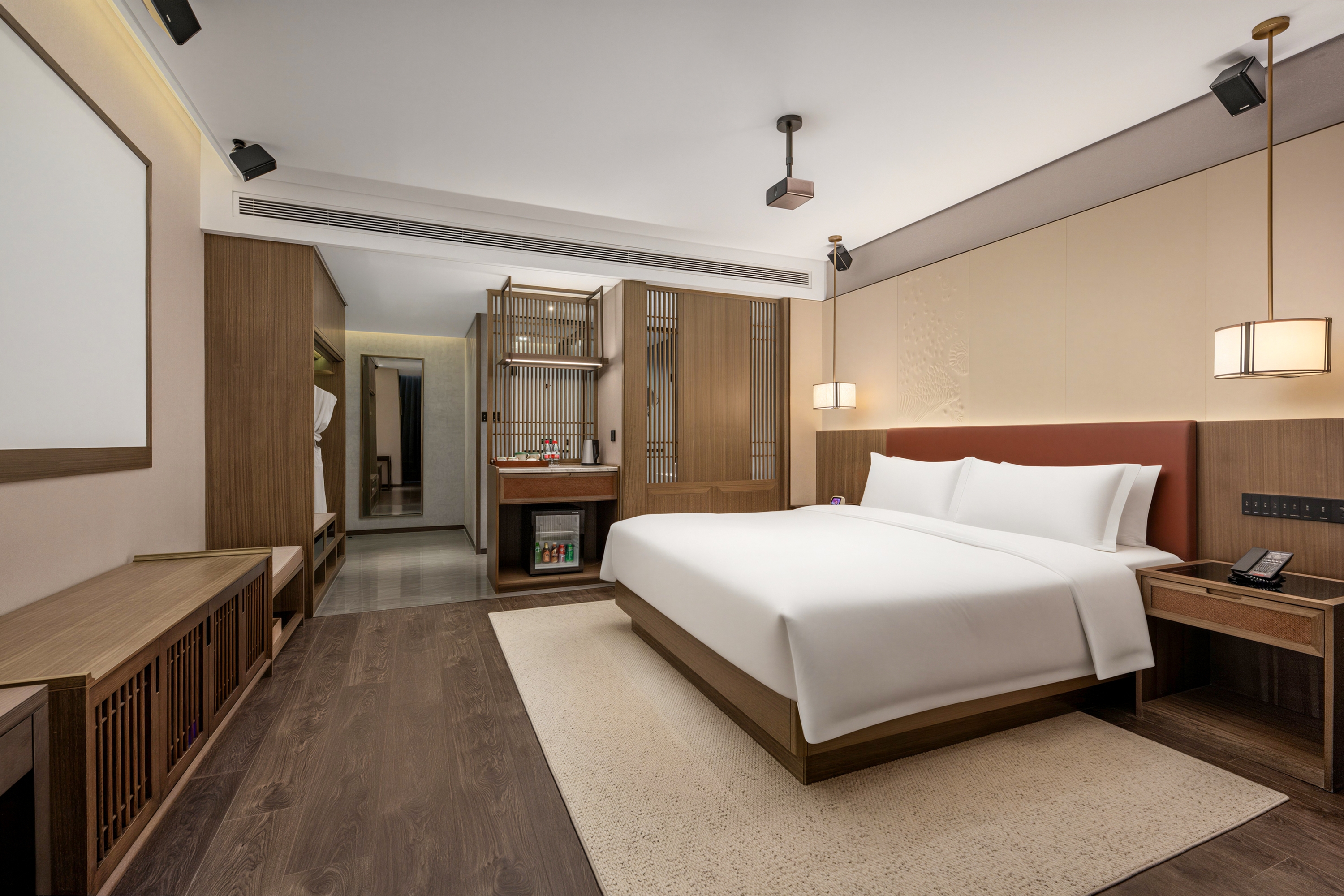 Guest room at the Ramada Plaza by Wyndham Jinan West Railway Station in Jinan, Other than US/Canada