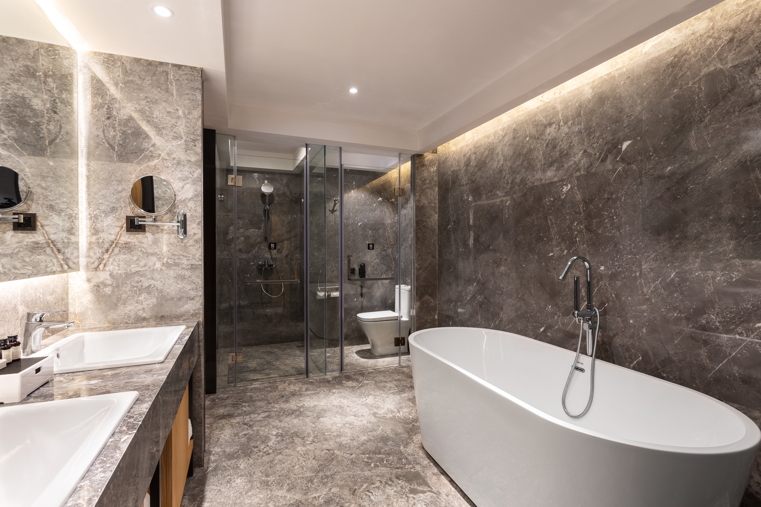Guest room bath at the Ramada Encore by Wyndham Kunming West in Kunming, Other than US/Canada