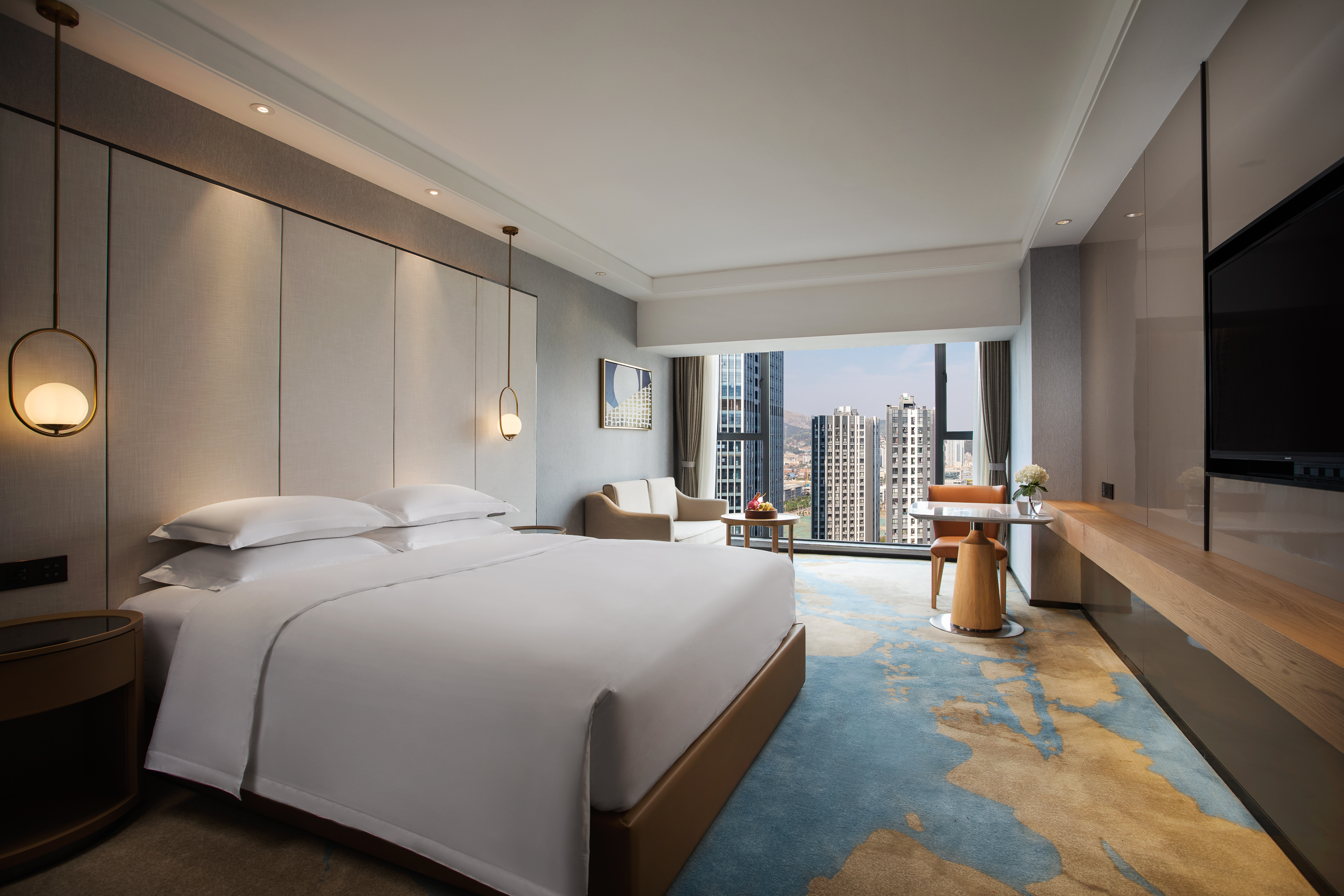 King bed guest room at the Ramada Encore by Wyndham Kunming West in Kunming, Other than US/Canada