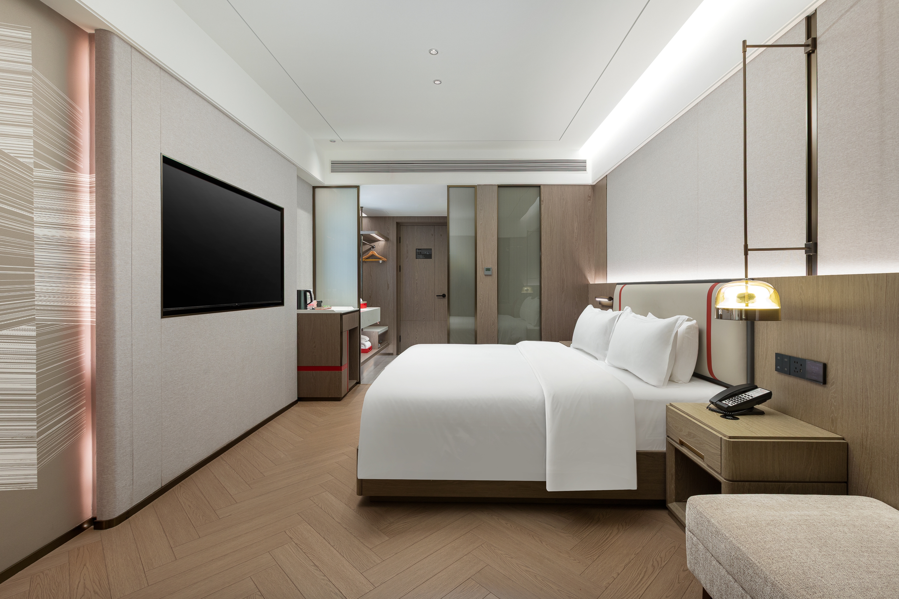 Guest room at the Ramada Encore by Wyndham Kunming Jingkai in Kunming, Other than US/Canada