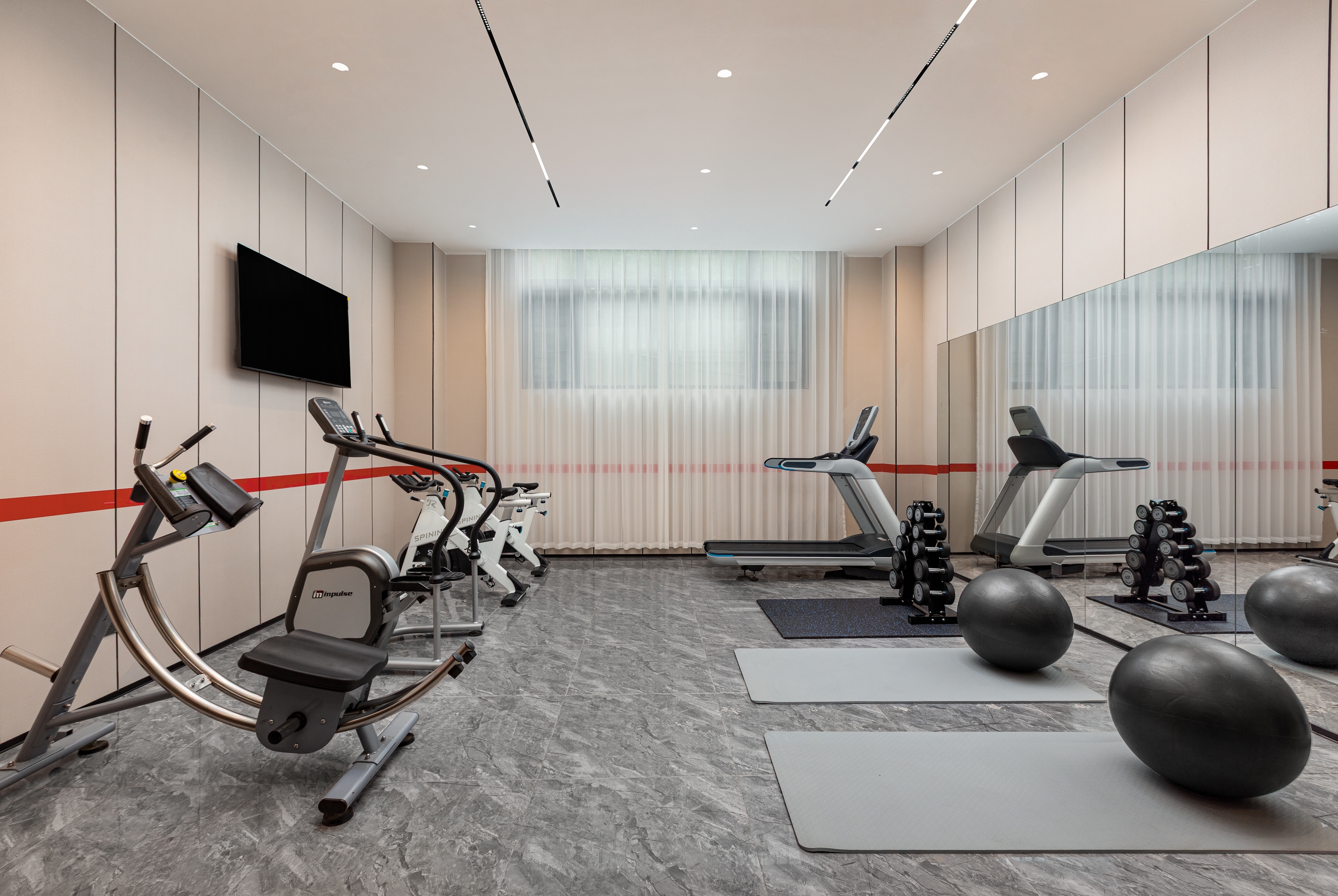 Fitness room at Ramada Encore by Wyndham Kunming South Station in Kunming, Other than US/Canada