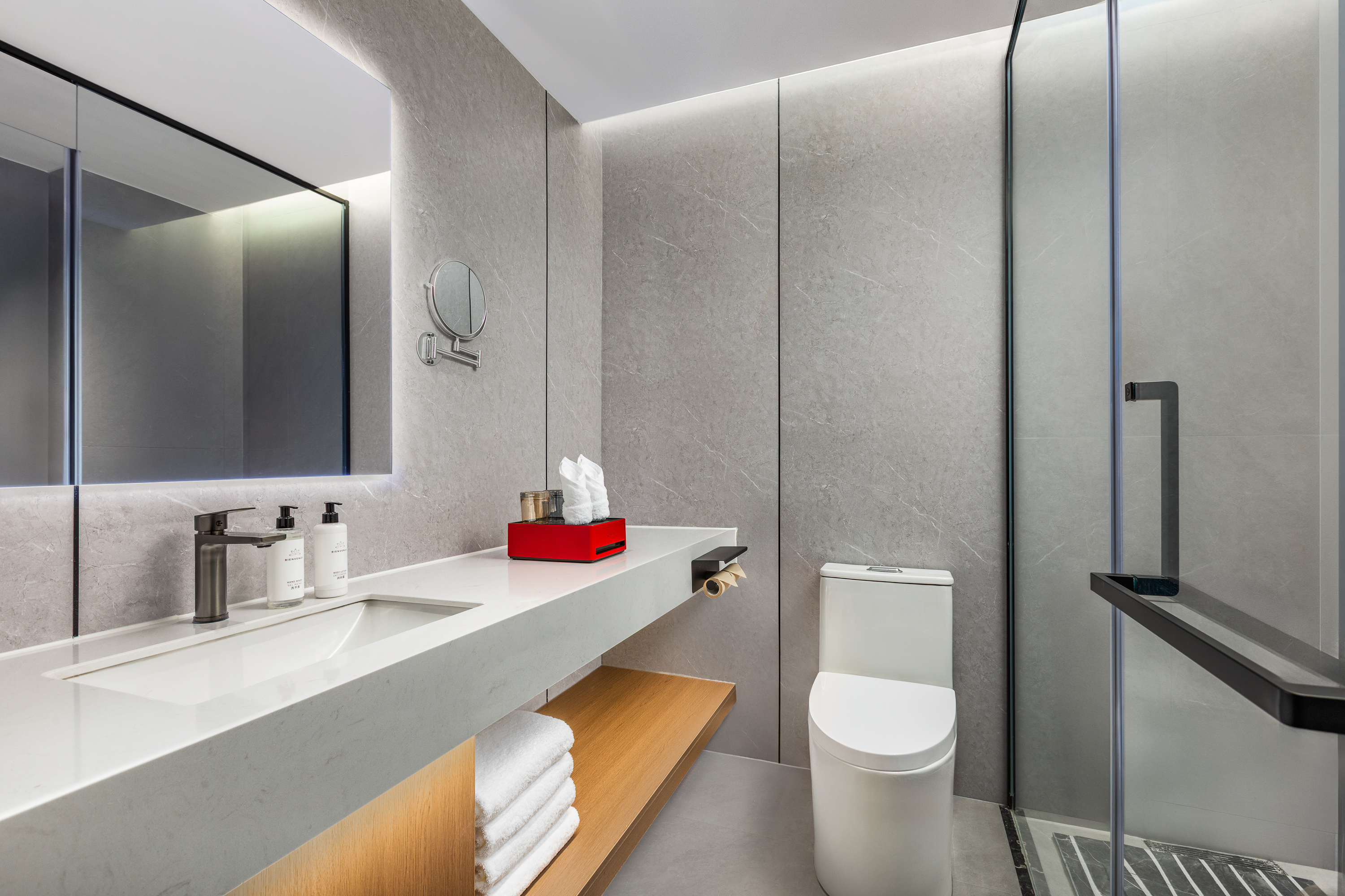 Guest room bath at the Ramada Encore by Wyndham Kunming South Station in Kunming, Other than US/Canada