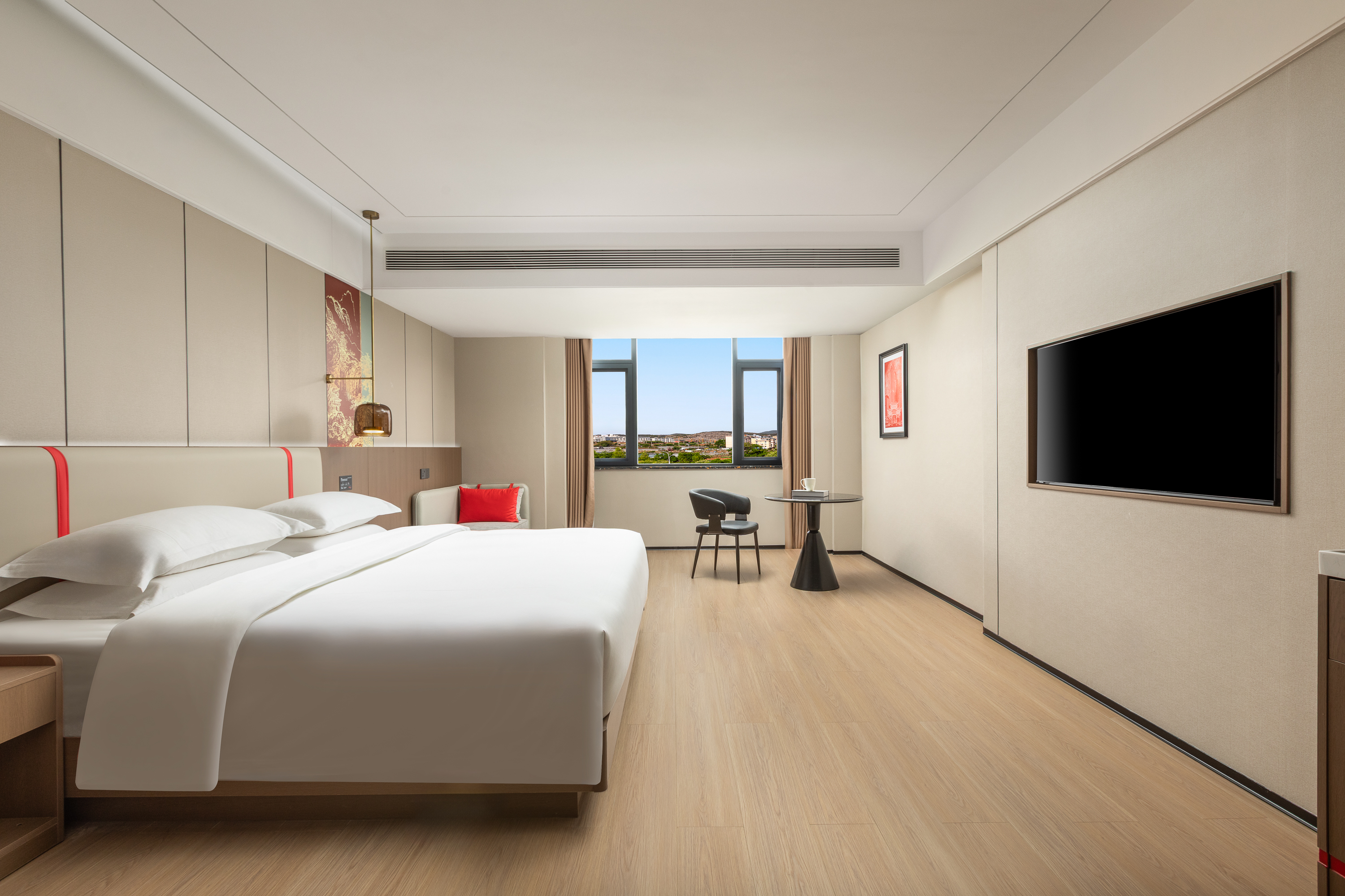 Guest room at the Ramada Encore by Wyndham Kunming South Station in Kunming, Other than US/Canada
