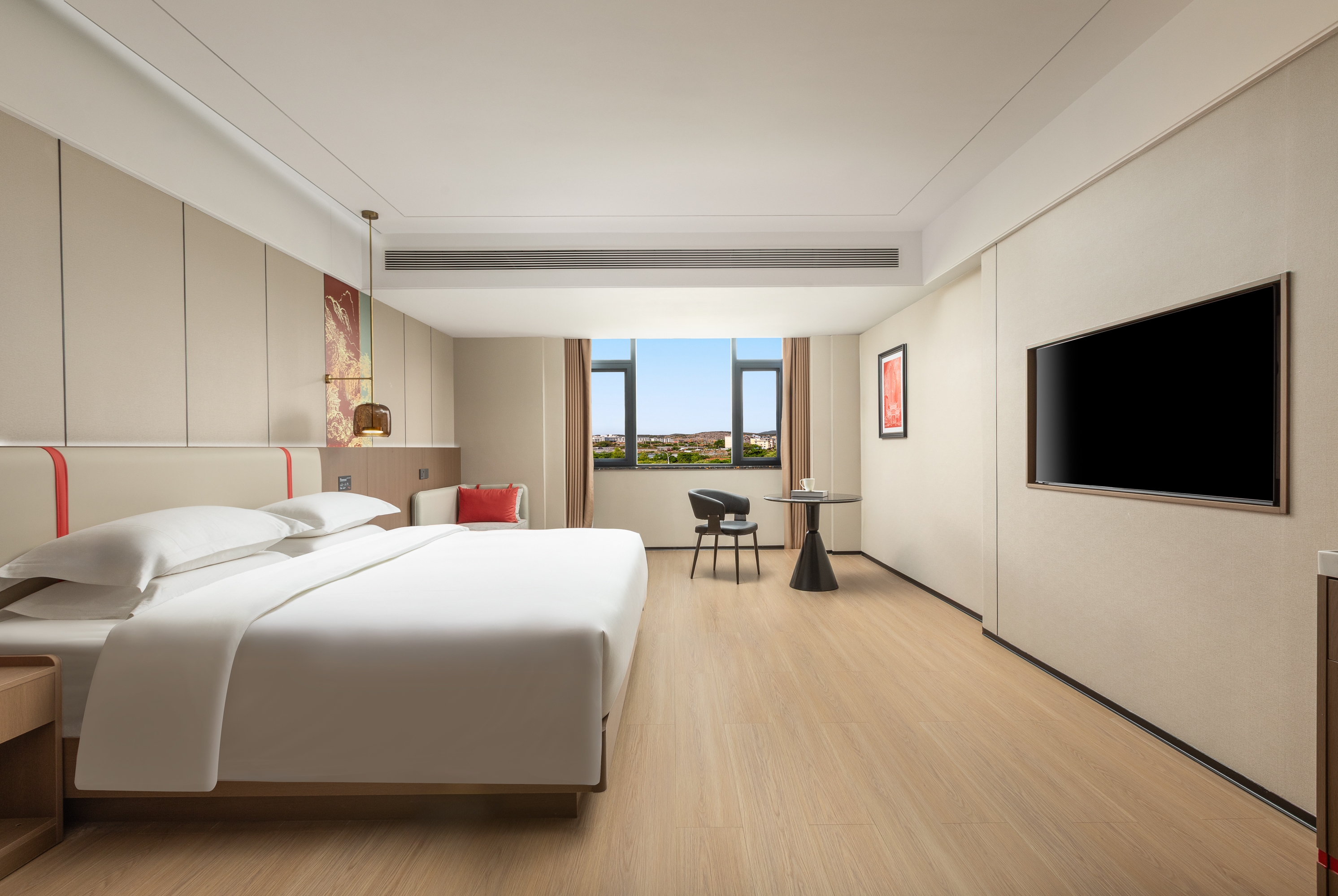 Guest room at the Ramada Encore by Wyndham Kunming South Station in Kunming, Other than US/Canada