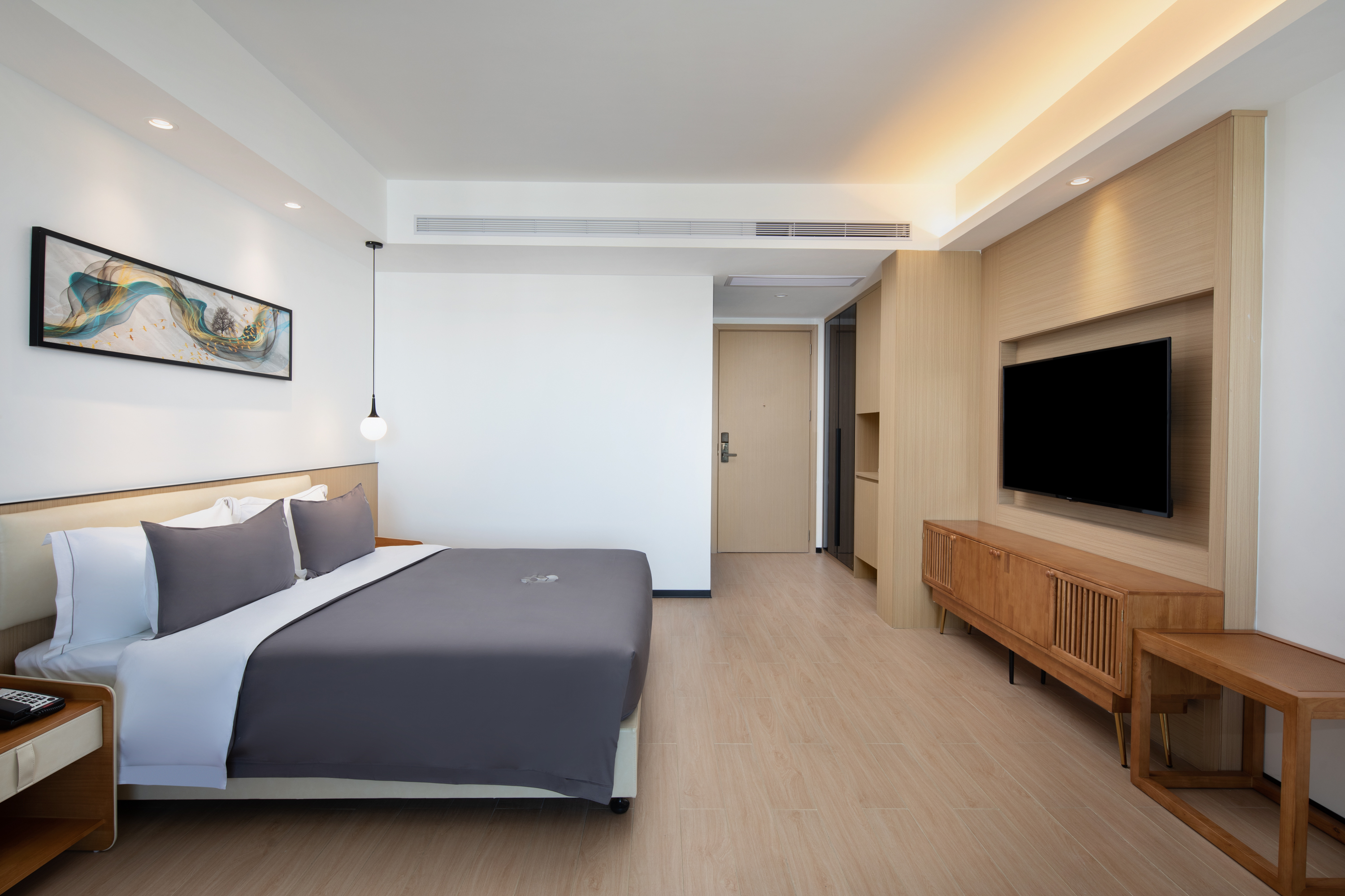 Guest room at the Ramada Encore by Wyndham Jiusuo Downtown in Ledong, Other than US/Canada