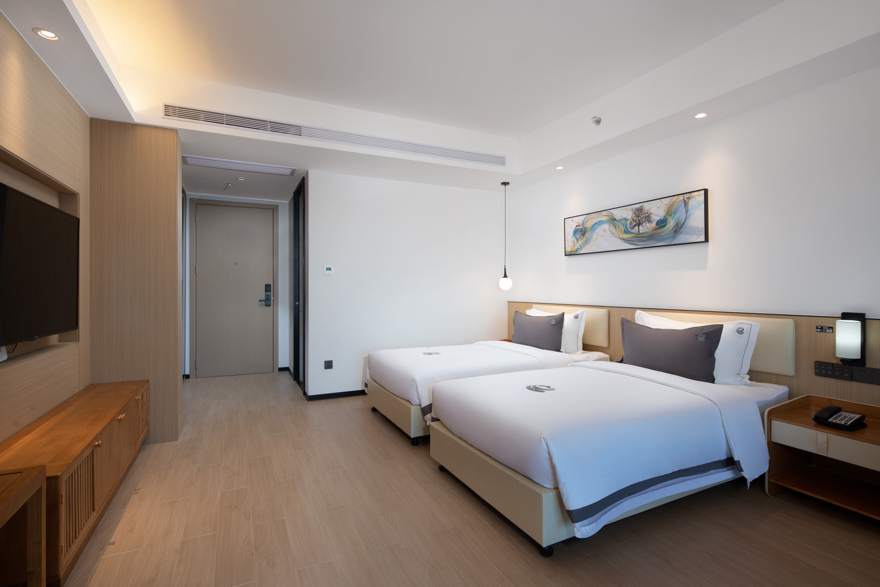 Guest room at the Ramada Encore by Wyndham Jiusuo Downtown in Ledong, Other than US/Canada