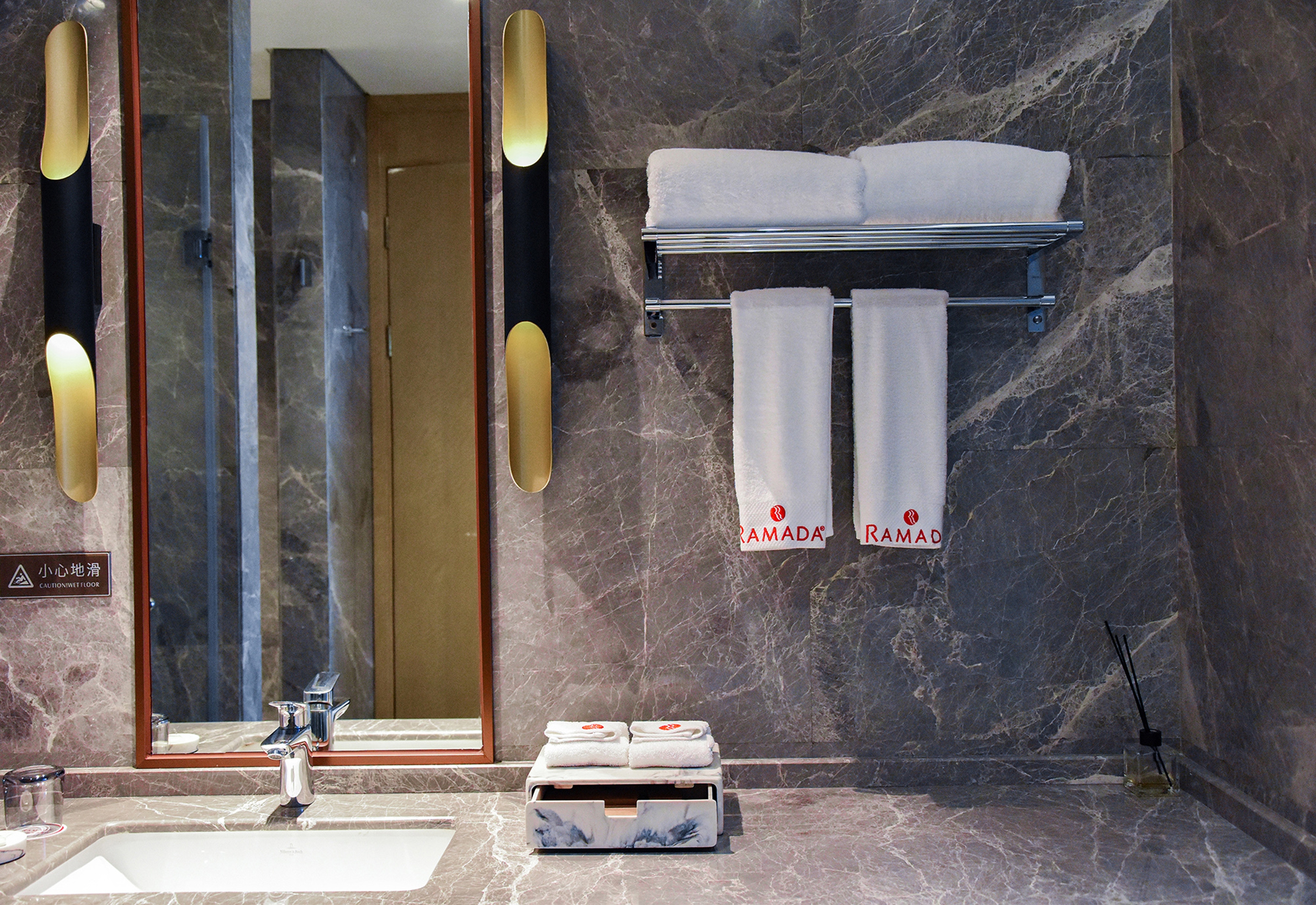 Guest room bath at the Ramada by Wyndham Leshan in Leshan, Other than US/Canada