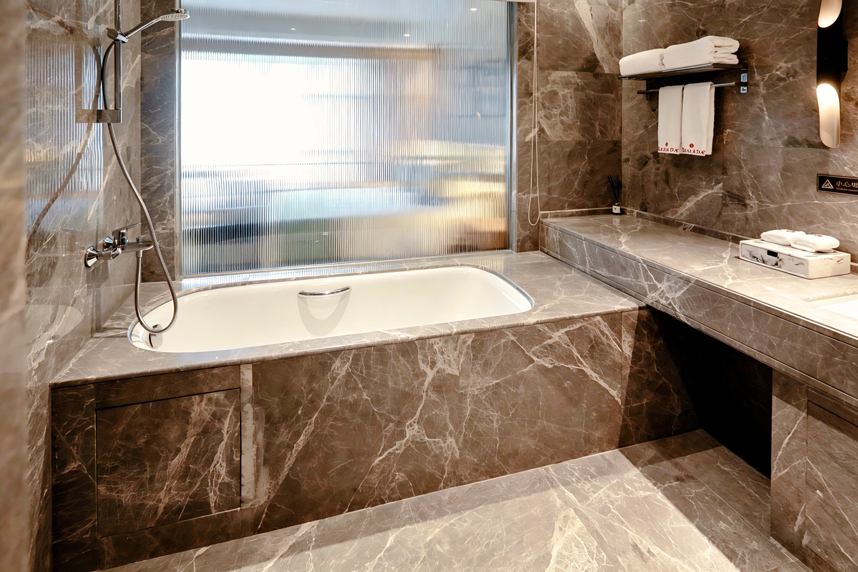 Guest room bath at the Ramada by Wyndham Leshan in Leshan, Other than US/Canada