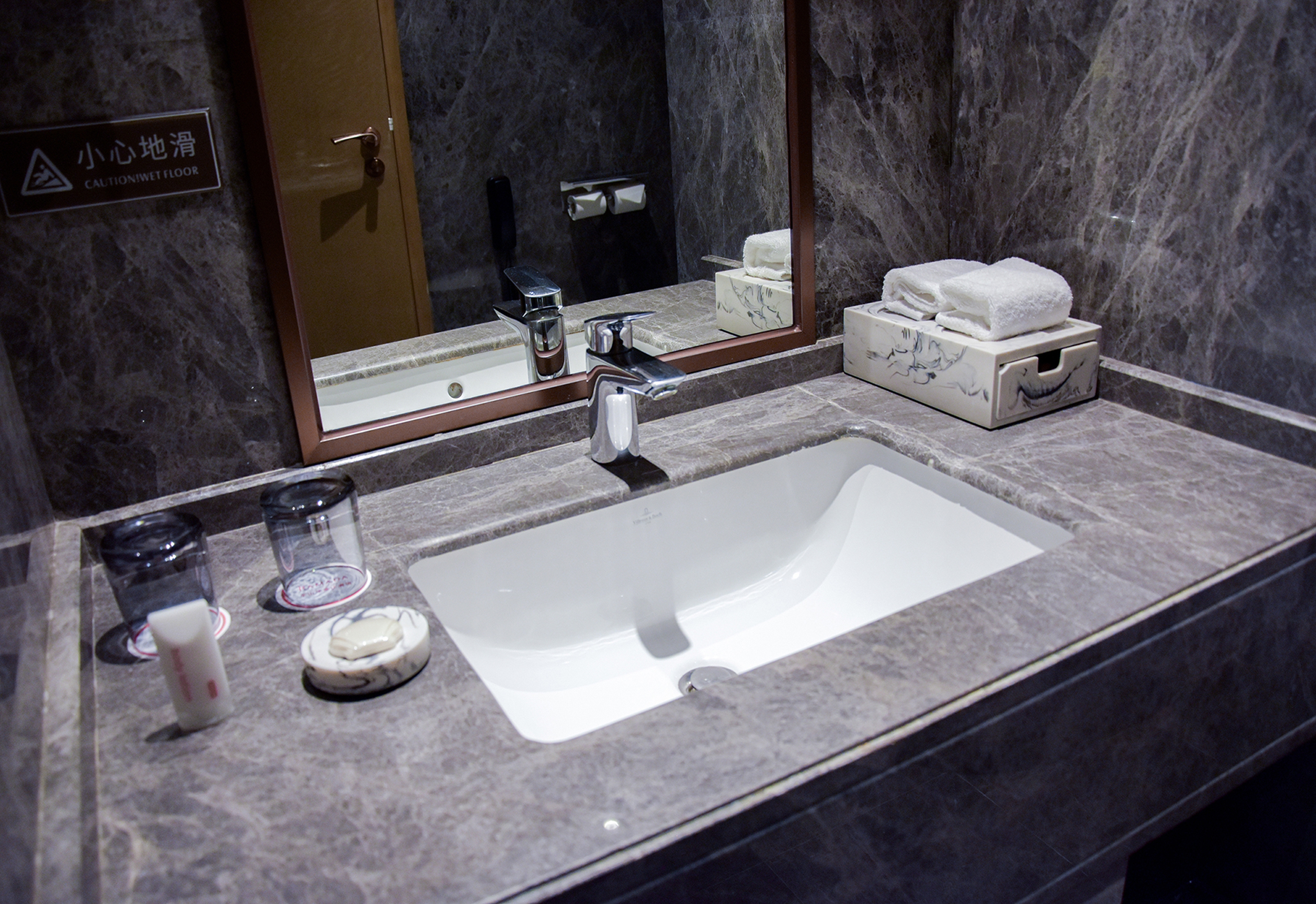Guest room bath at the Ramada by Wyndham Leshan in Leshan, Other than US/Canada