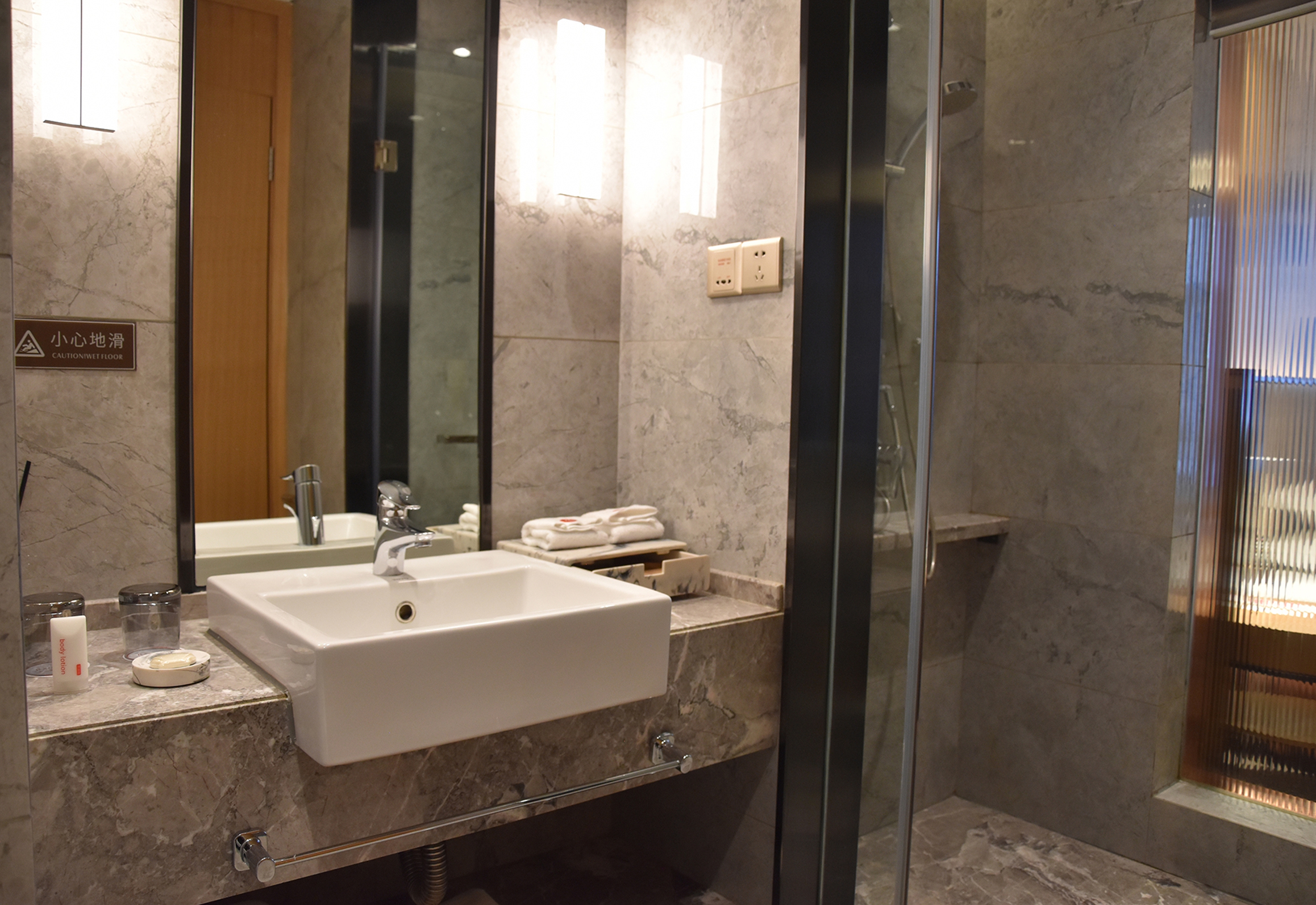 Guest room bath at the Ramada by Wyndham Leshan in Leshan, Other than US/Canada