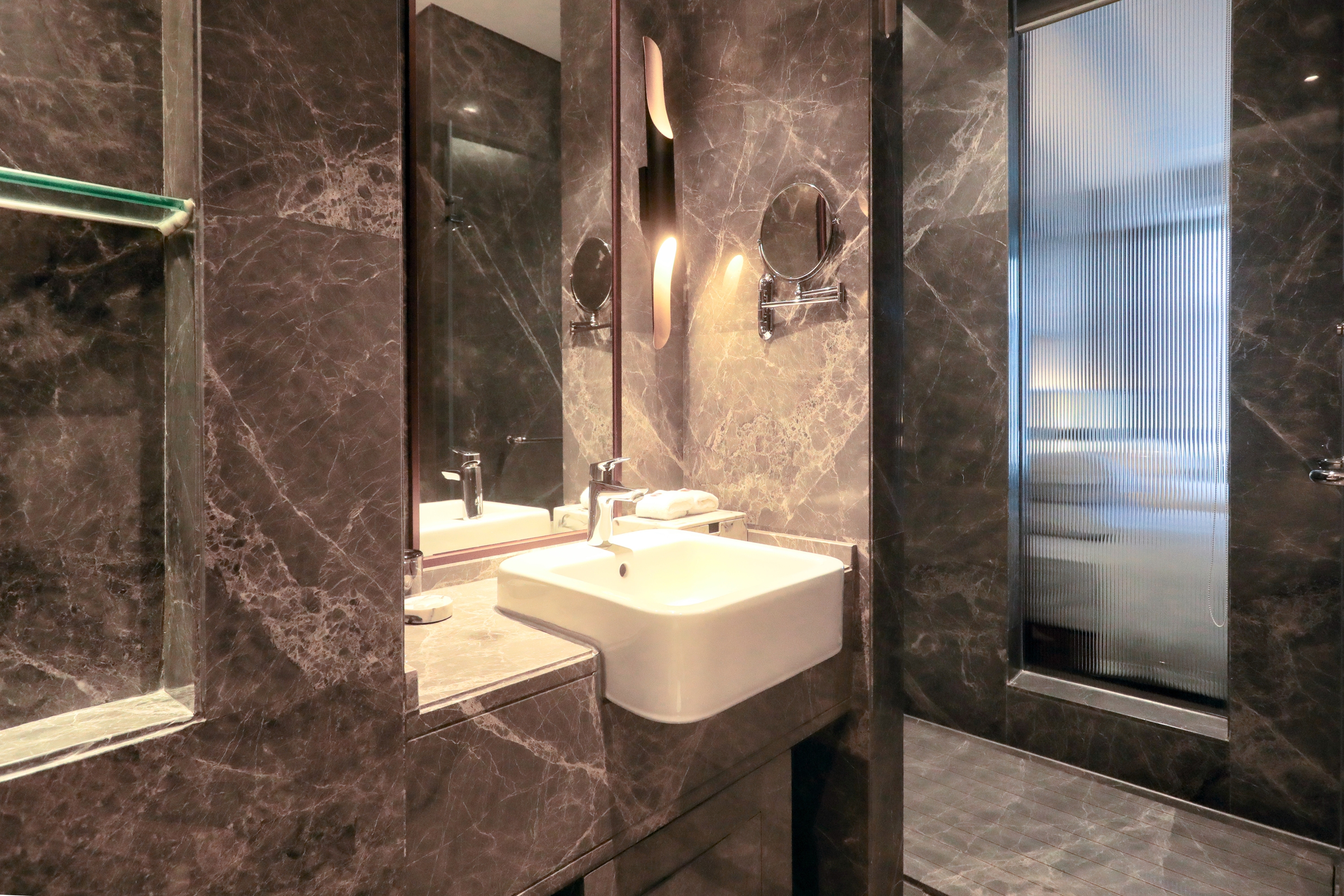 Guest room bath at the Ramada by Wyndham Leshan in Leshan, Other than US/Canada