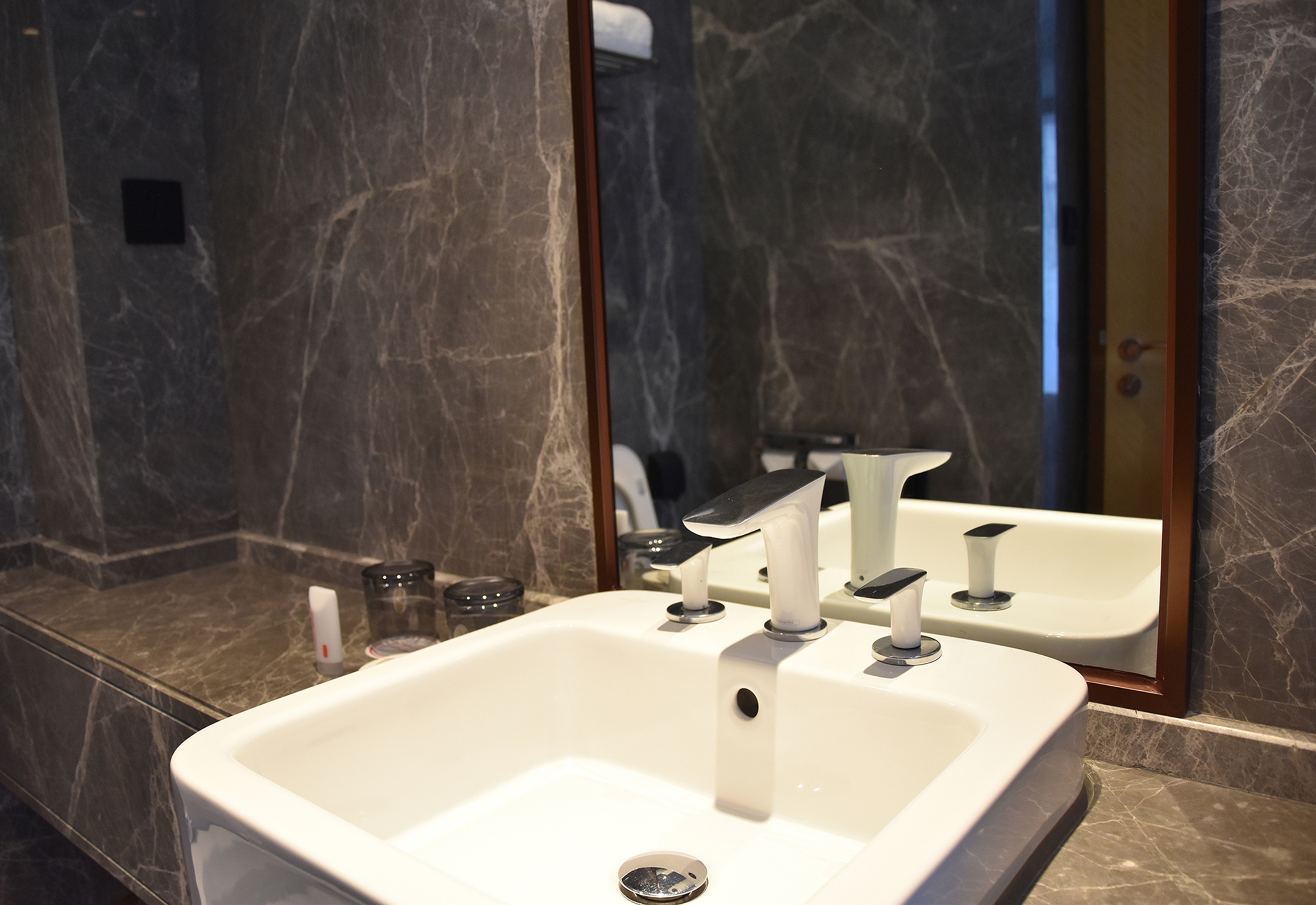 Guest room bath at the Ramada by Wyndham Leshan in Leshan, Other than US/Canada