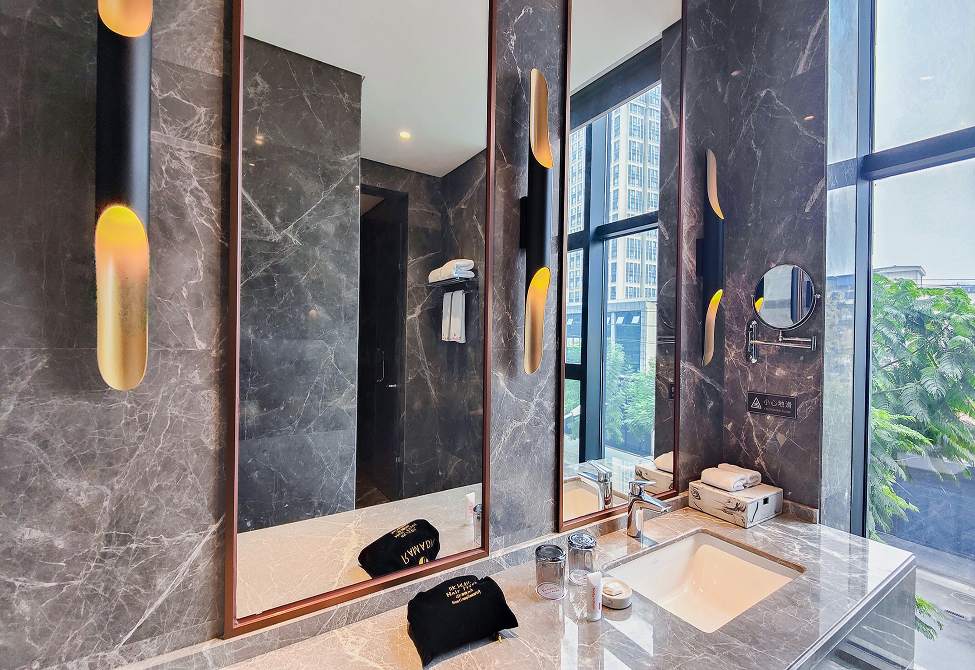 Guest room bath at the Ramada by Wyndham Leshan in Leshan, Other than US/Canada