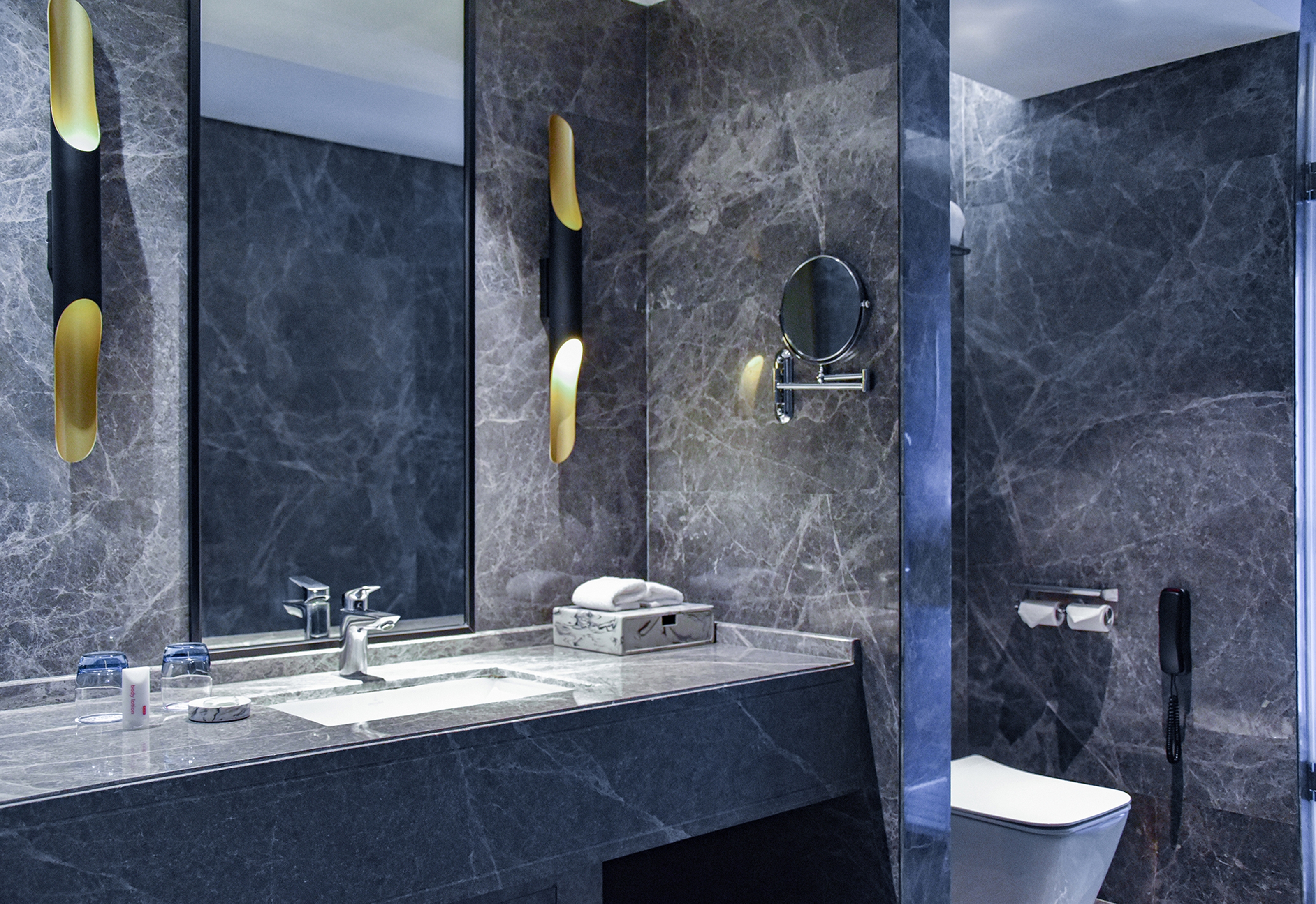 Guest room bath at the Ramada by Wyndham Leshan in Leshan, Other than US/Canada