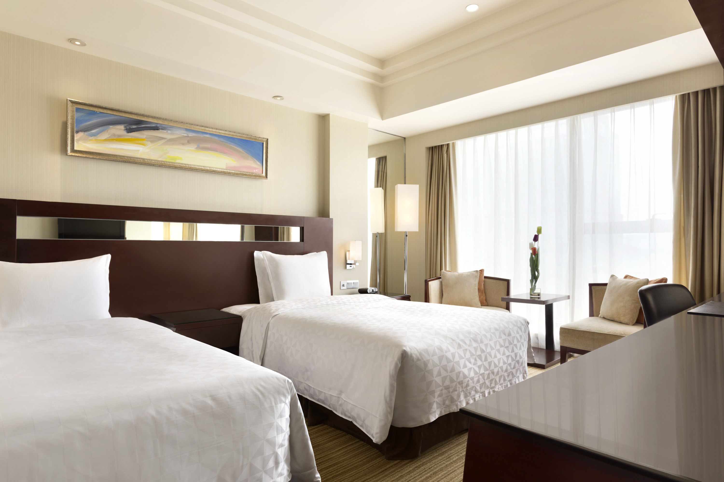 Guest room at the Ramada Plaza by Wyndham Lianyungang in Lianyungang, Other than US/Canada