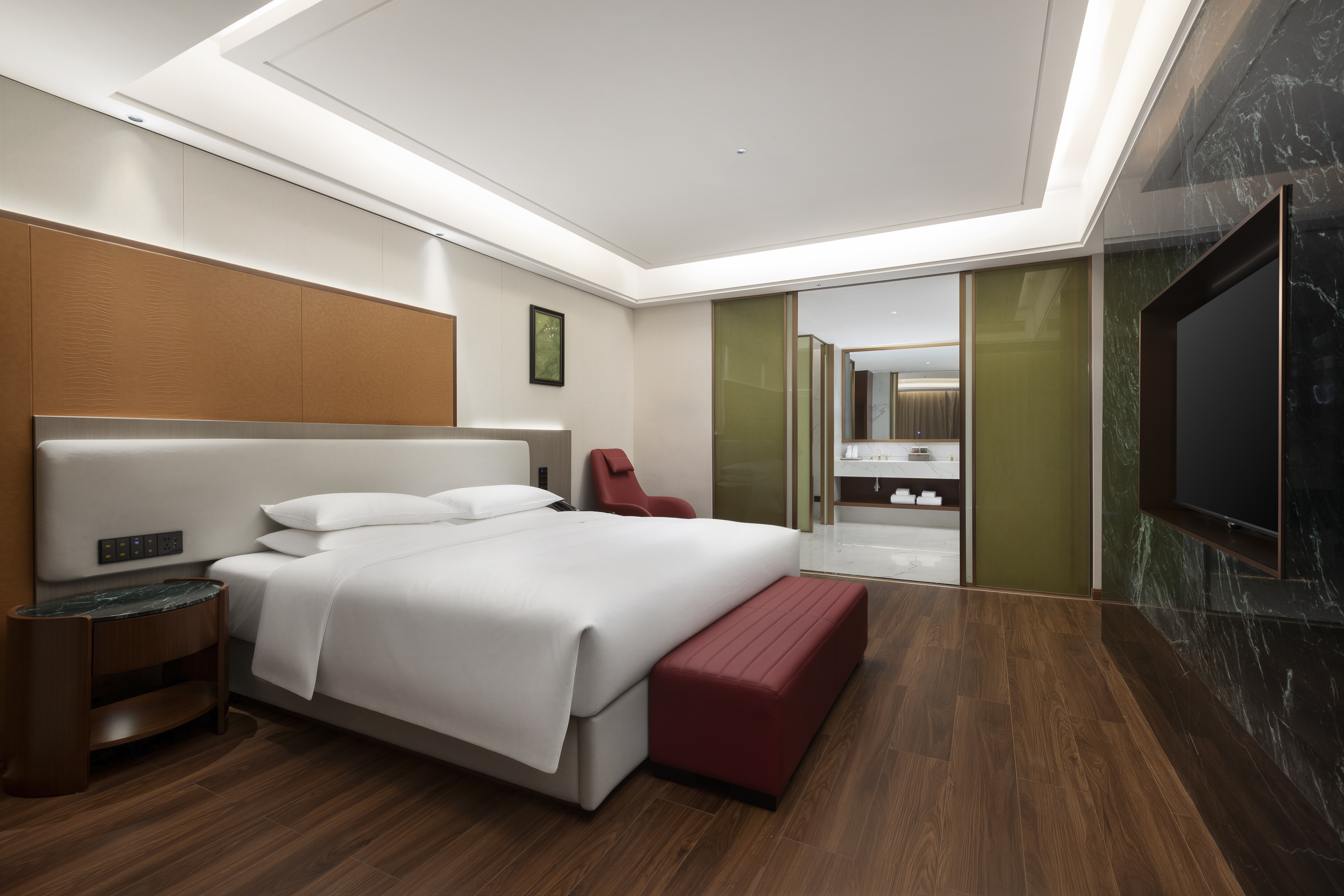 Guest room at the Ramada by Wyndham Luzhou Longmatan in Luzhou, Other than US/Canada