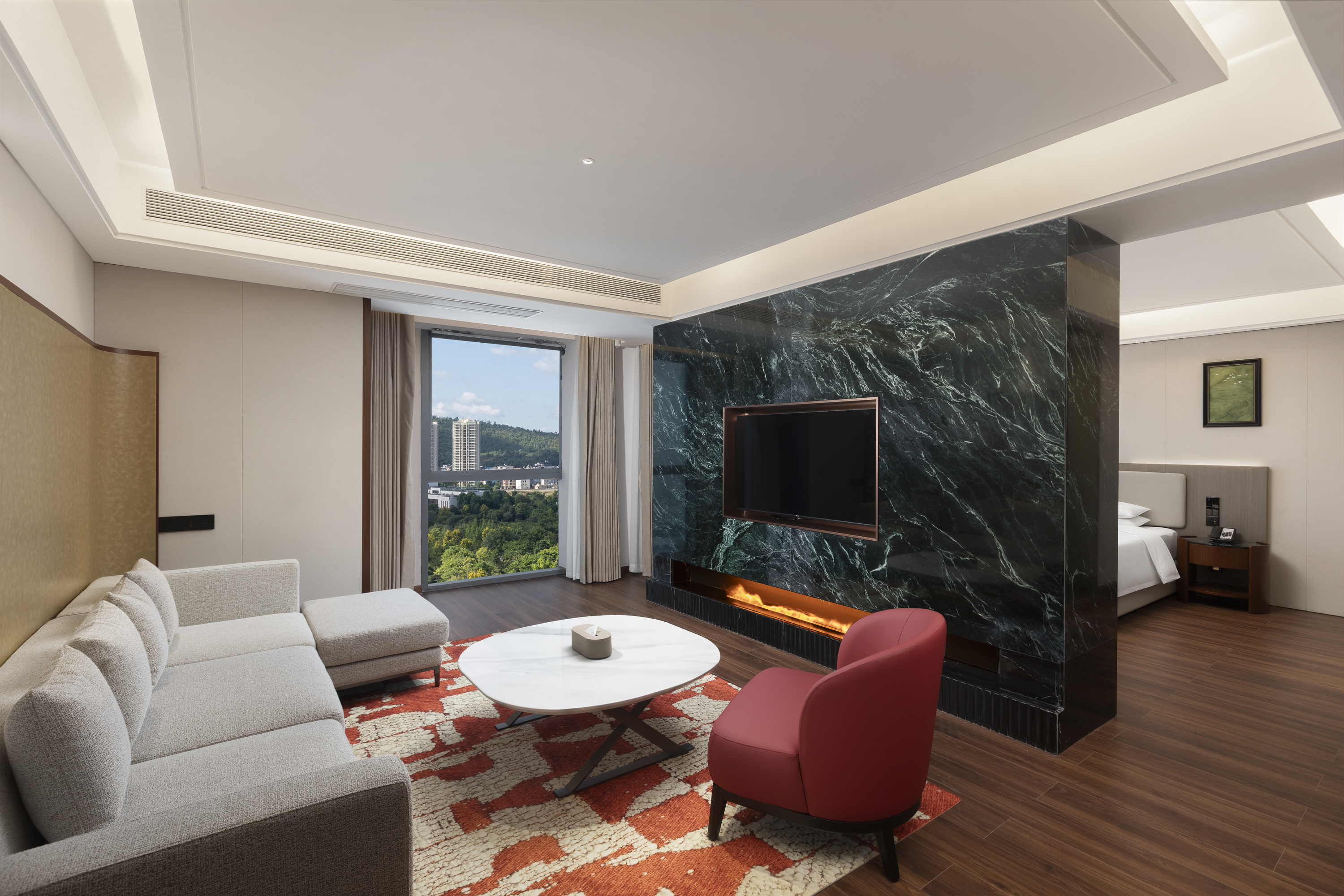 Guest room at the Ramada by Wyndham Luzhou Longmatan in Luzhou, Other than US/Canada