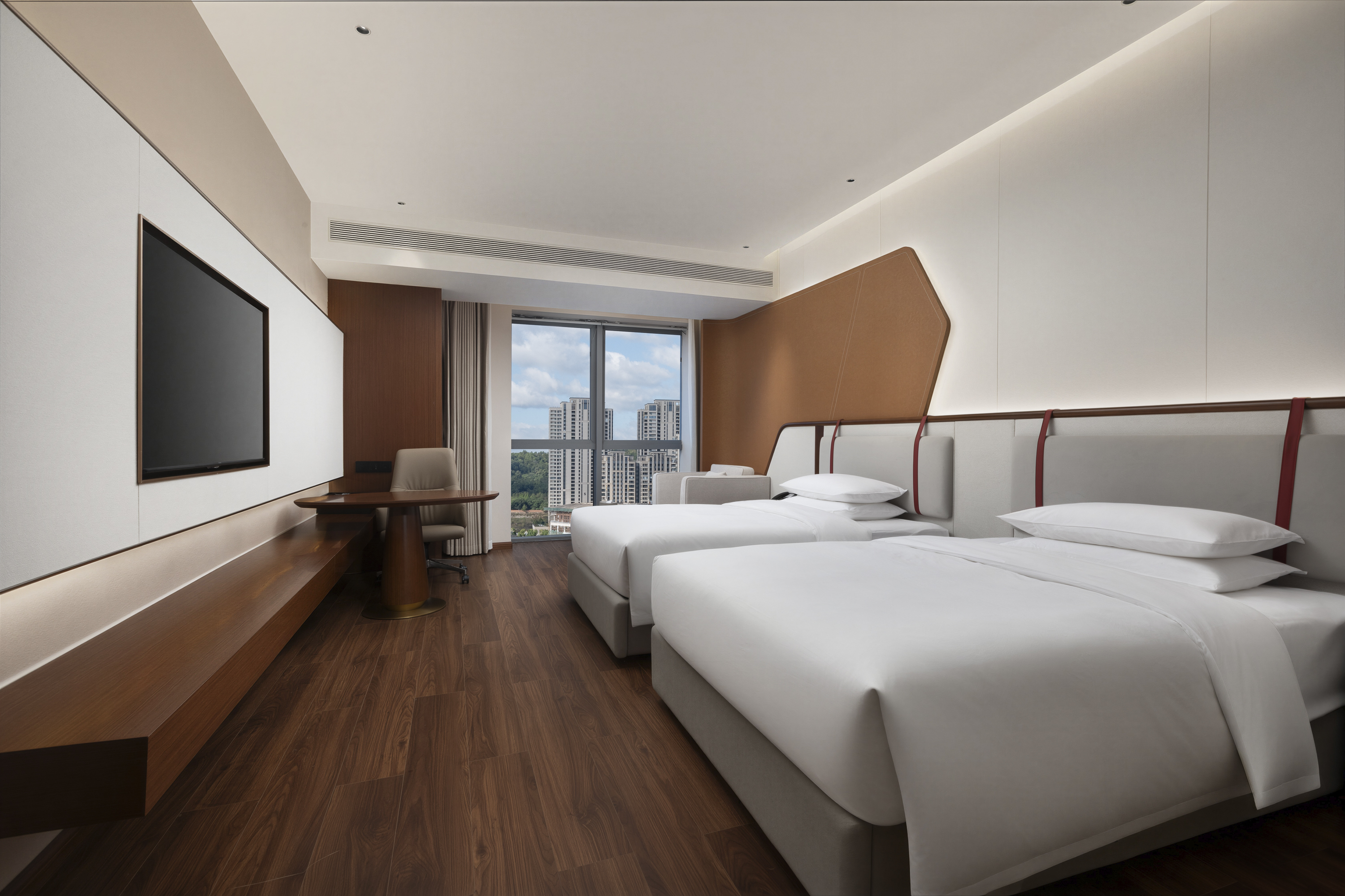 Guest room at the Ramada by Wyndham Luzhou Longmatan in Luzhou, Other than US/Canada