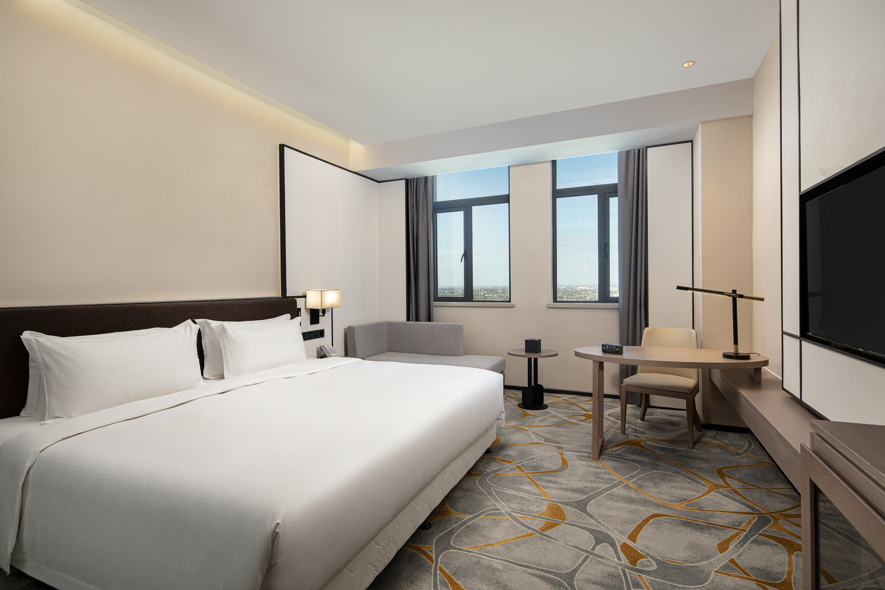 Guest room at the Ramada by Wyndham Pinghu in Pinghu, Other than US/Canada