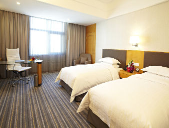 Guest room at the Ramada Plaza by Wyndham Shanghai Pudong Airport in Shanghai, Other than US/Canada