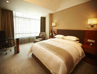 Guest room at the Ramada Plaza by Wyndham Shanghai Pudong Airport in Shanghai, Other than US/Canada