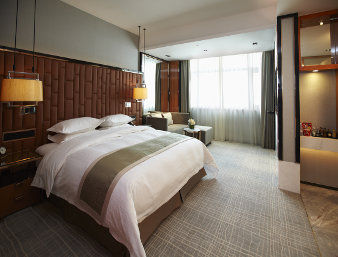 Guest room at the Ramada Plaza by Wyndham Shanghai Pudong Airport in Shanghai, Other than US/Canada