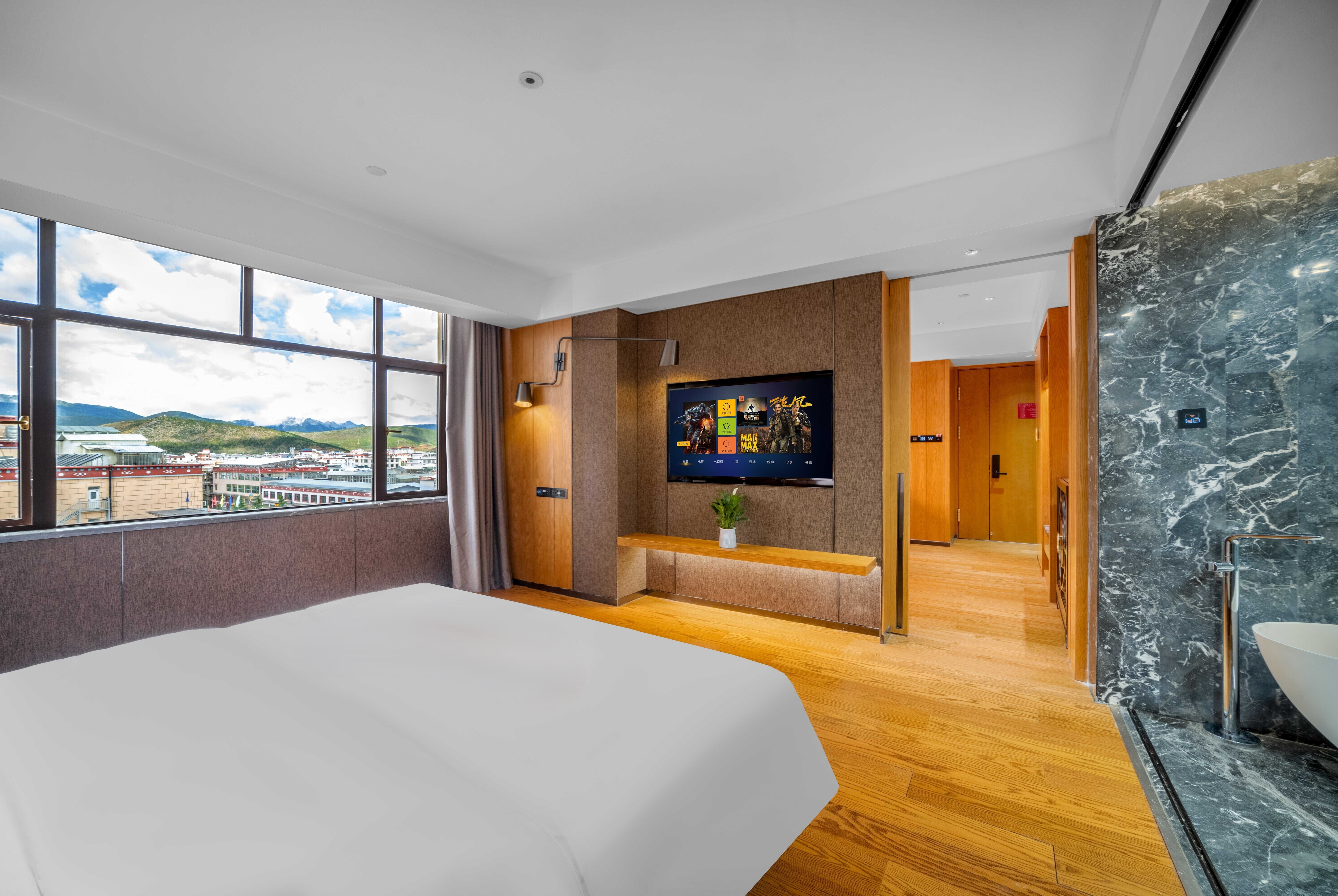 Guest room at the Ramada by Wyndham Diqing in Shangri-La City, Other than US/Canada