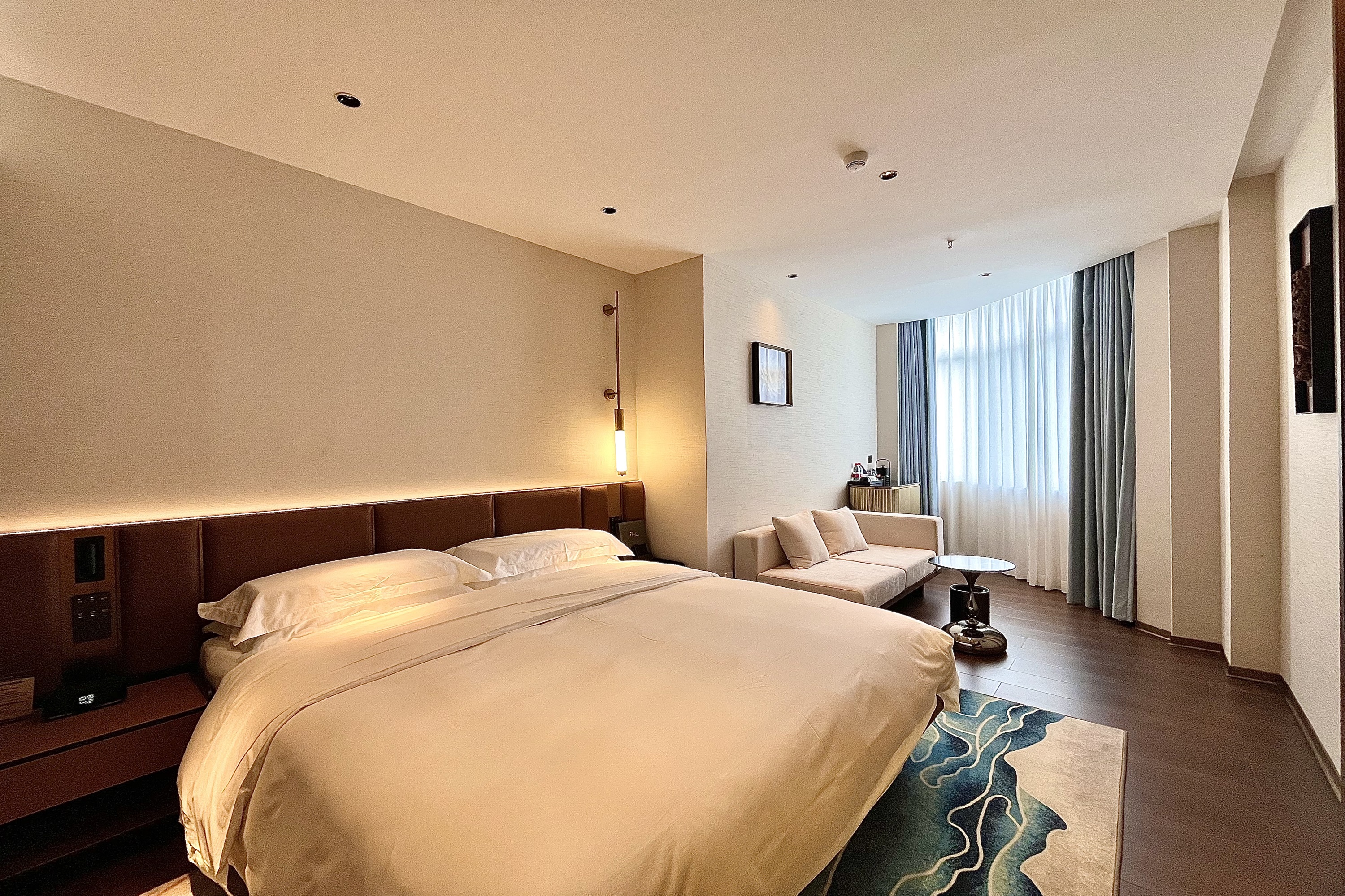 Guest room at the Ramada Encore by Wyndham Shantou Longhu in Shantou, Other than US/Canada