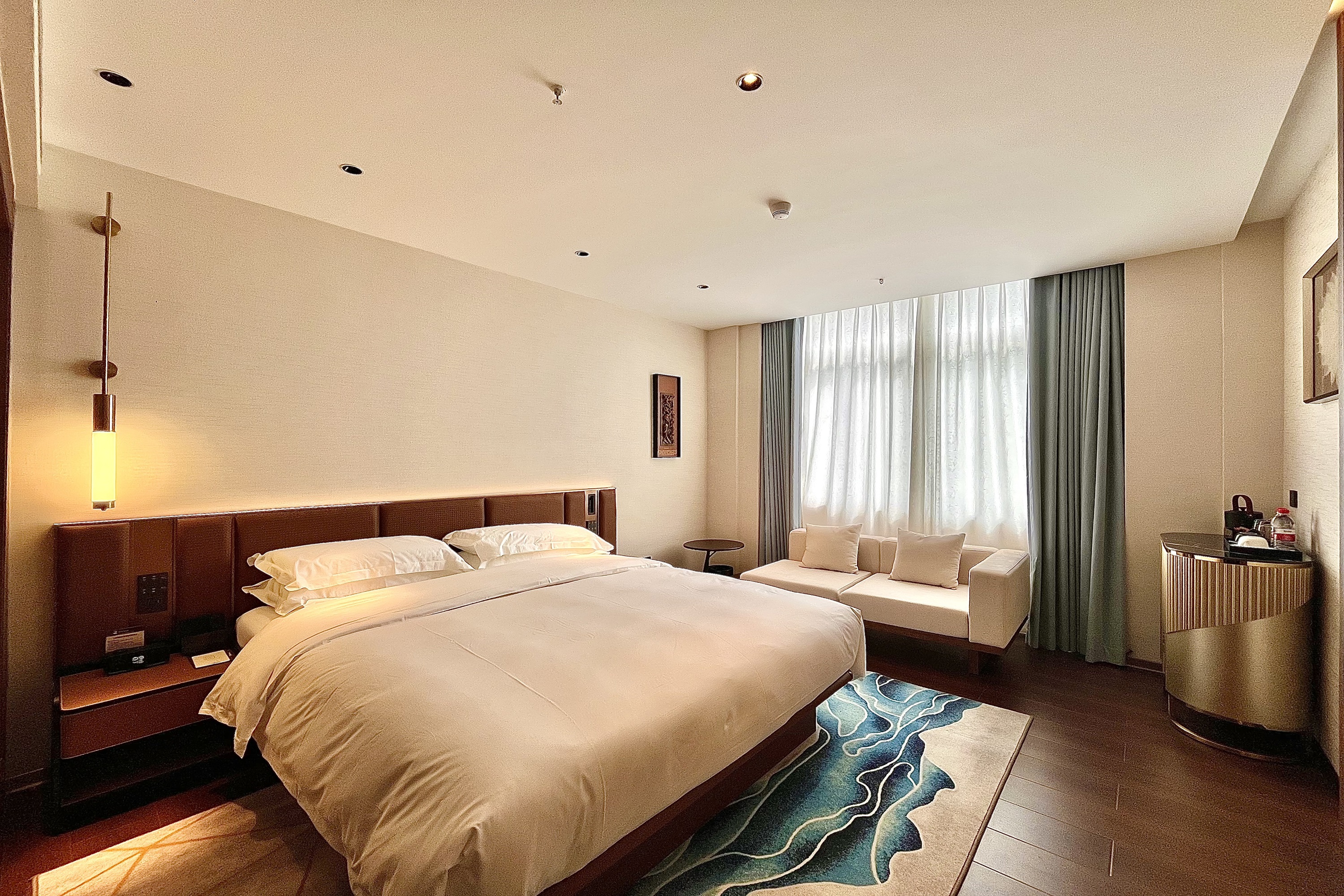 Guest room at the Ramada Encore by Wyndham Shantou Longhu in Shantou, Other than US/Canada