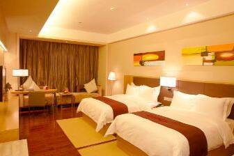 Guest room at the Ramada Plaza Shenzhen North in Shenzhen, Other than US/Canada