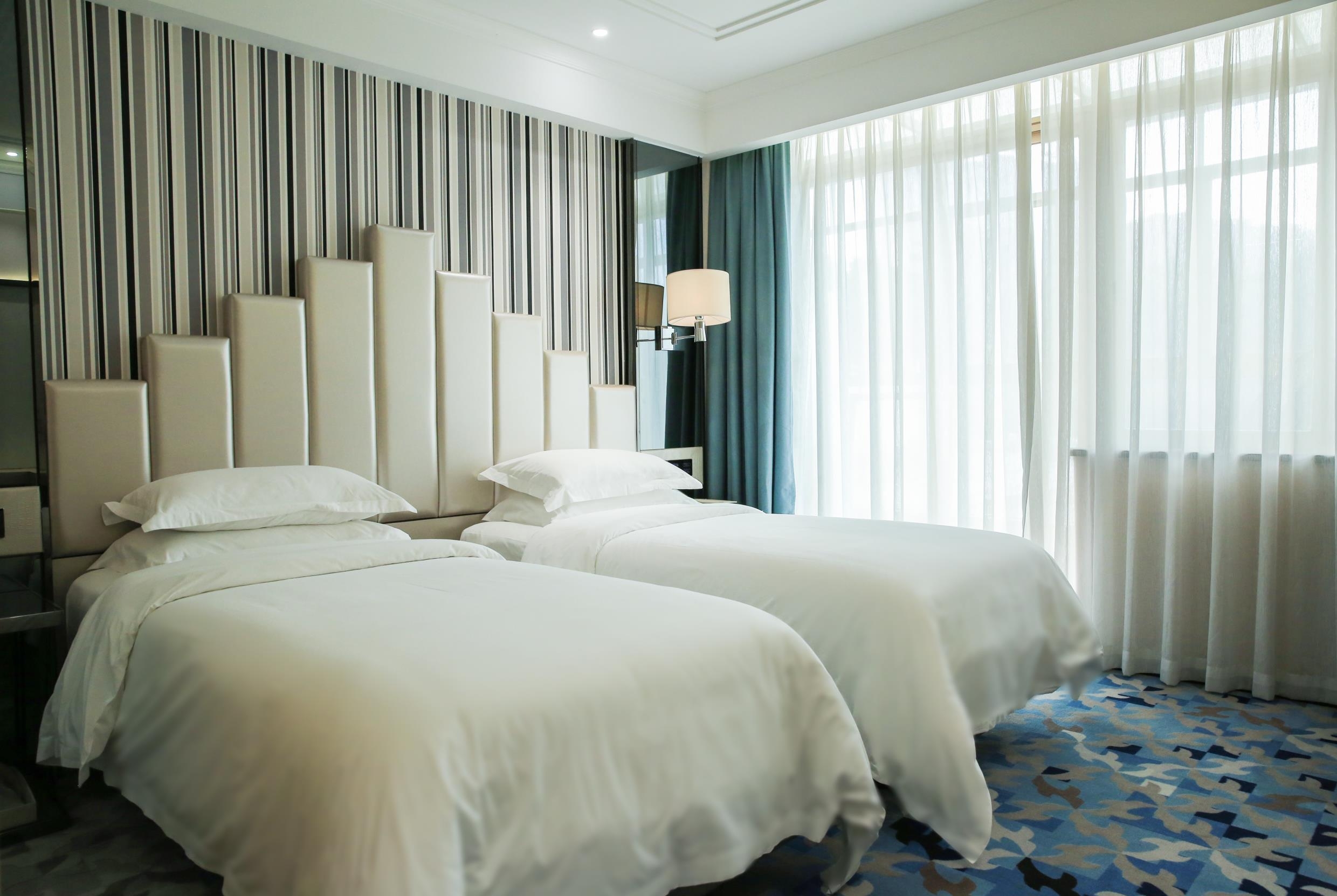 Guest room at the Ramada by Wyndham Shenzhen Baoan in Shenzhen, Other than US/Canada