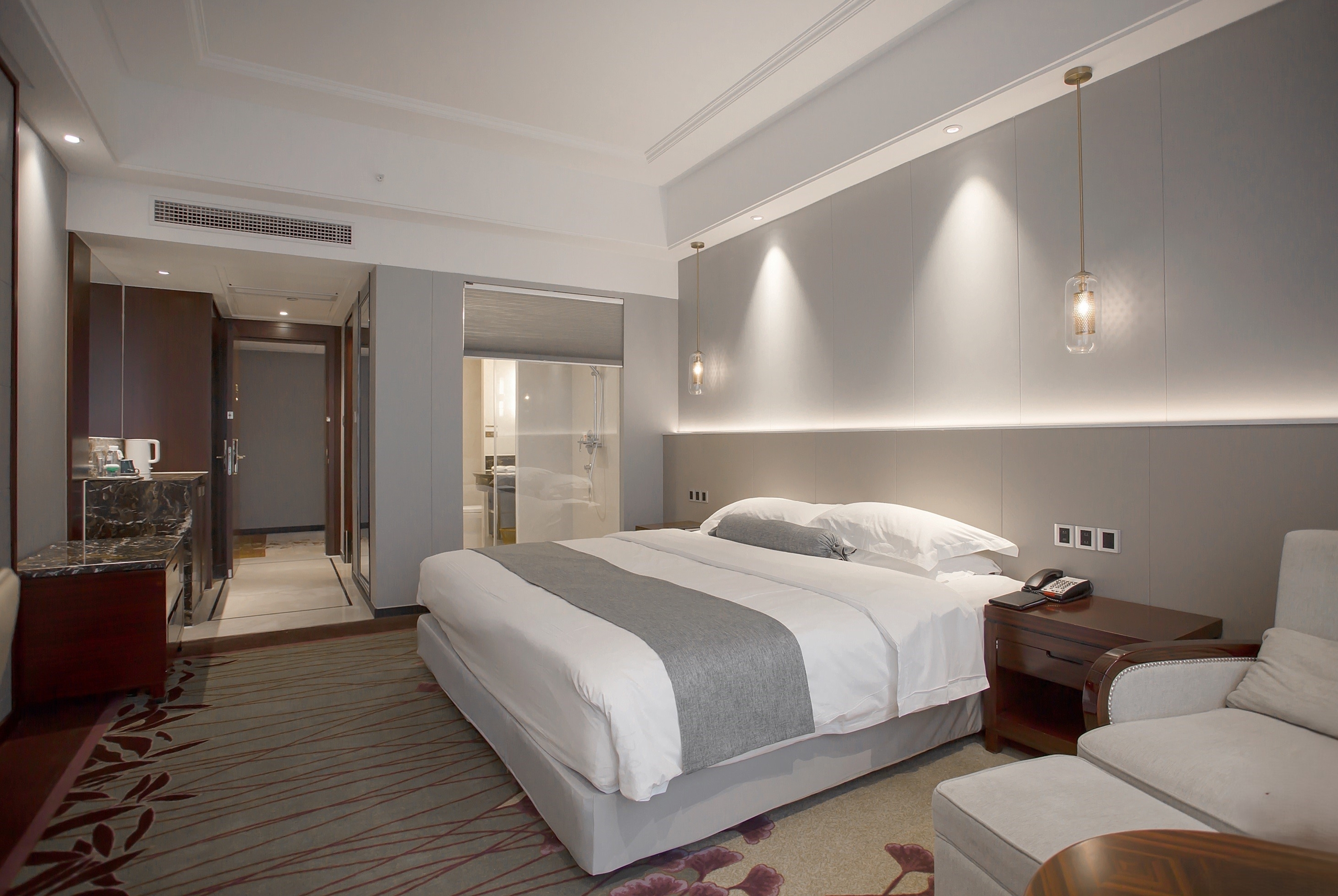 Guest room at the Ramada by Wyndham Suzhou Wujiang in Suzhou, Other than US/Canada