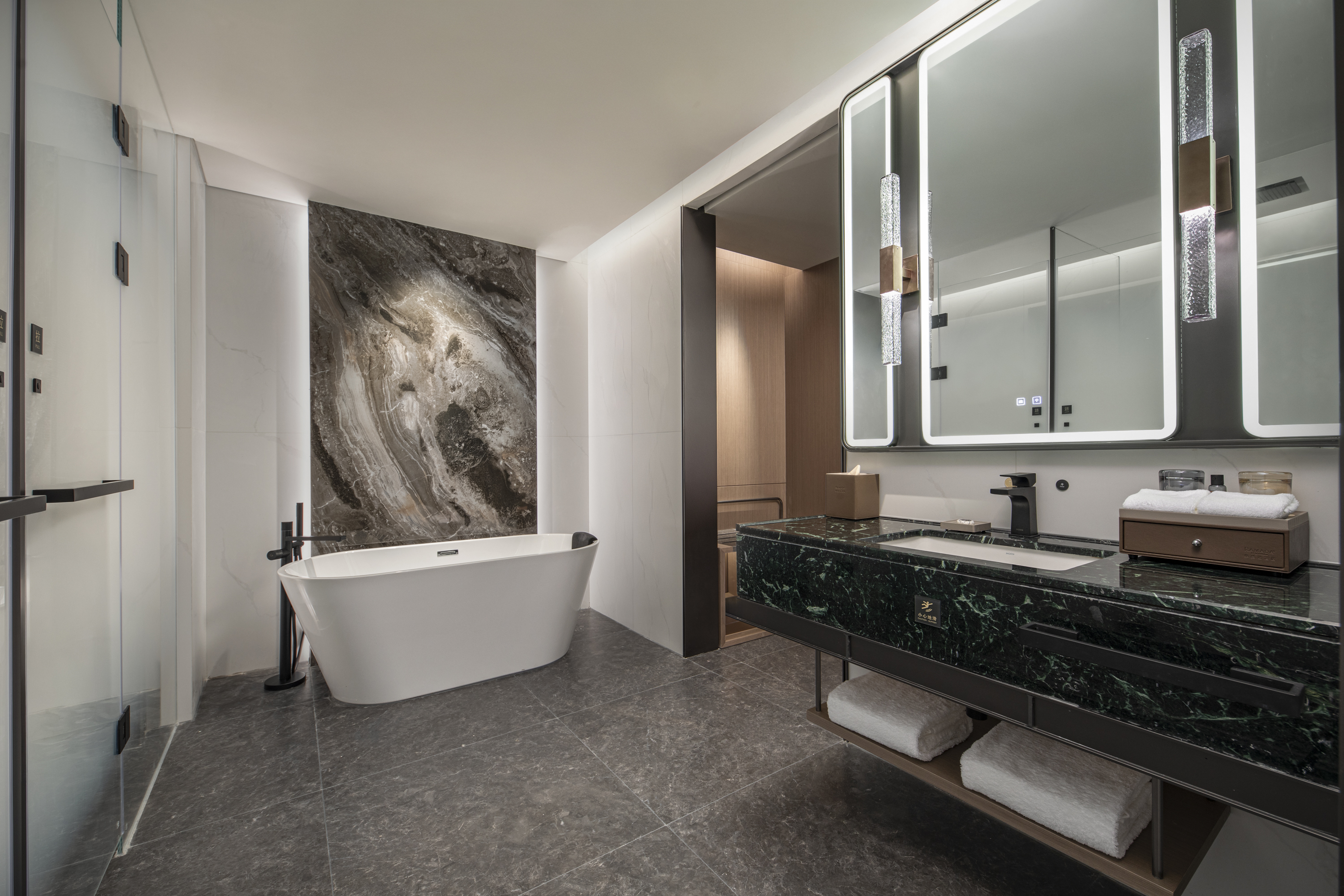 Guest room bath at the Ramada by Wyndham Taian Hi-tech in Taian, Other than US/Canada