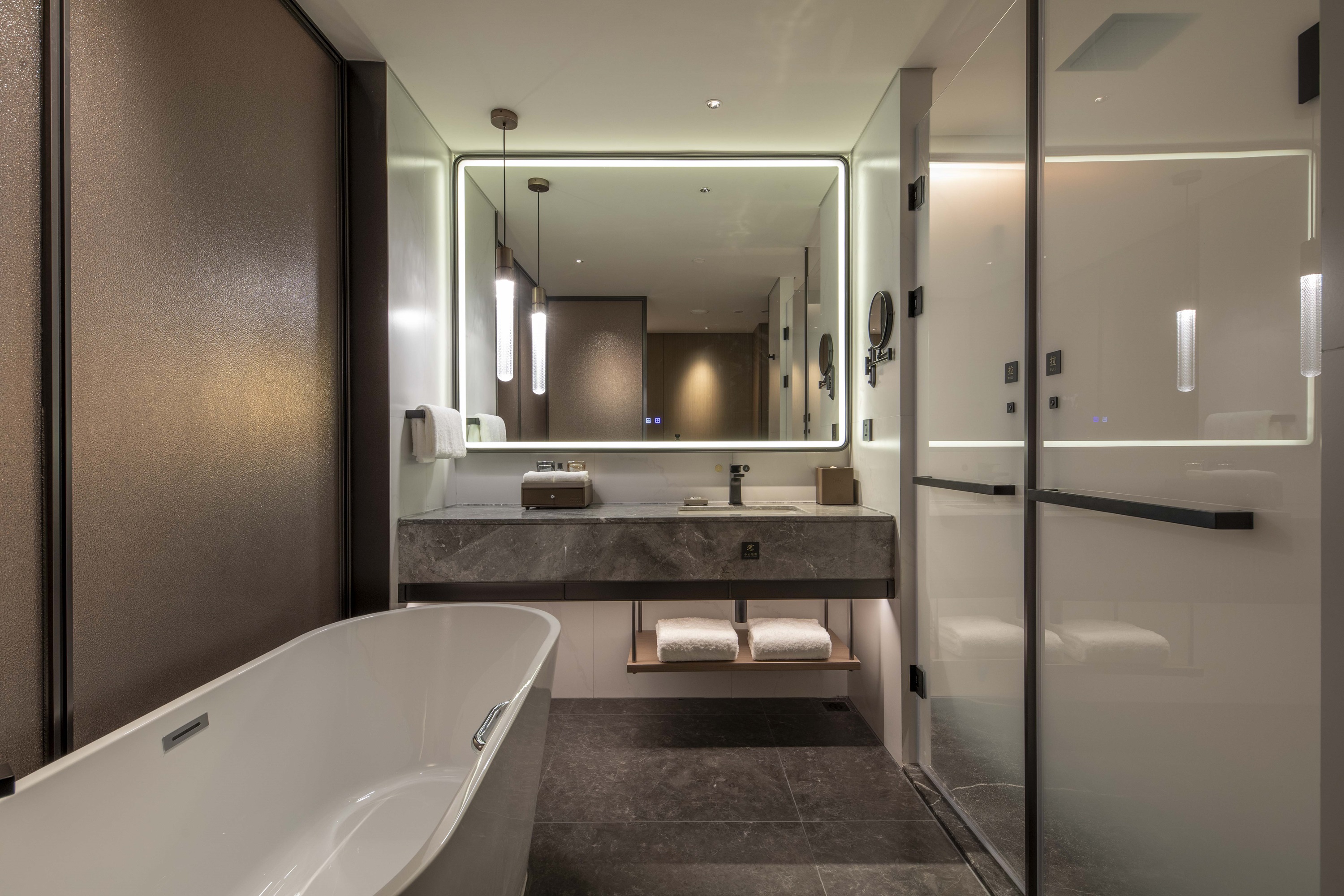 Guest room bath at the Ramada by Wyndham Taian Hi-tech in Taian, Other than US/Canada