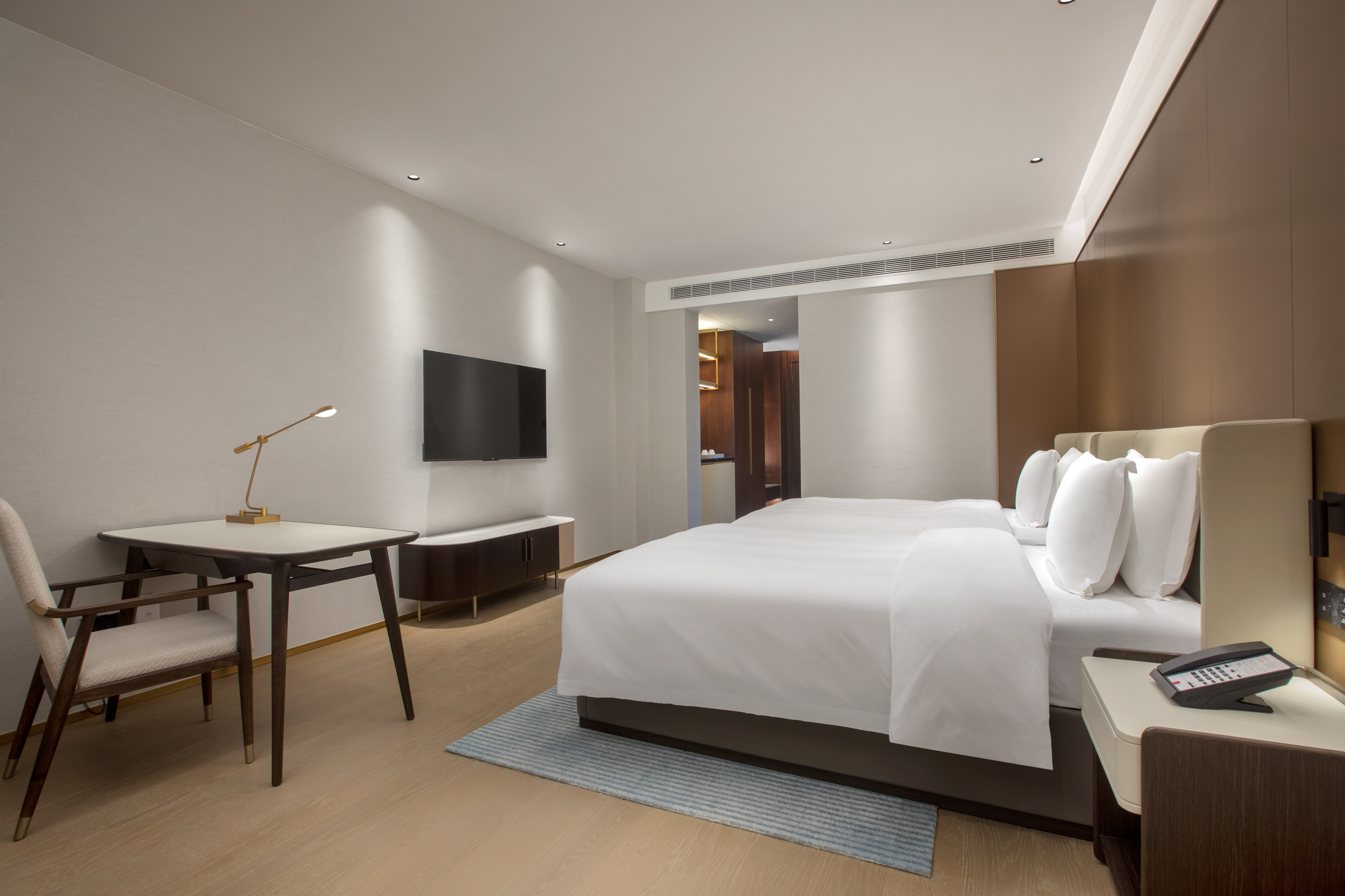 Guest room at the Ramada by Wyndham Taizhou West in Taizhou, Other than US/Canada
