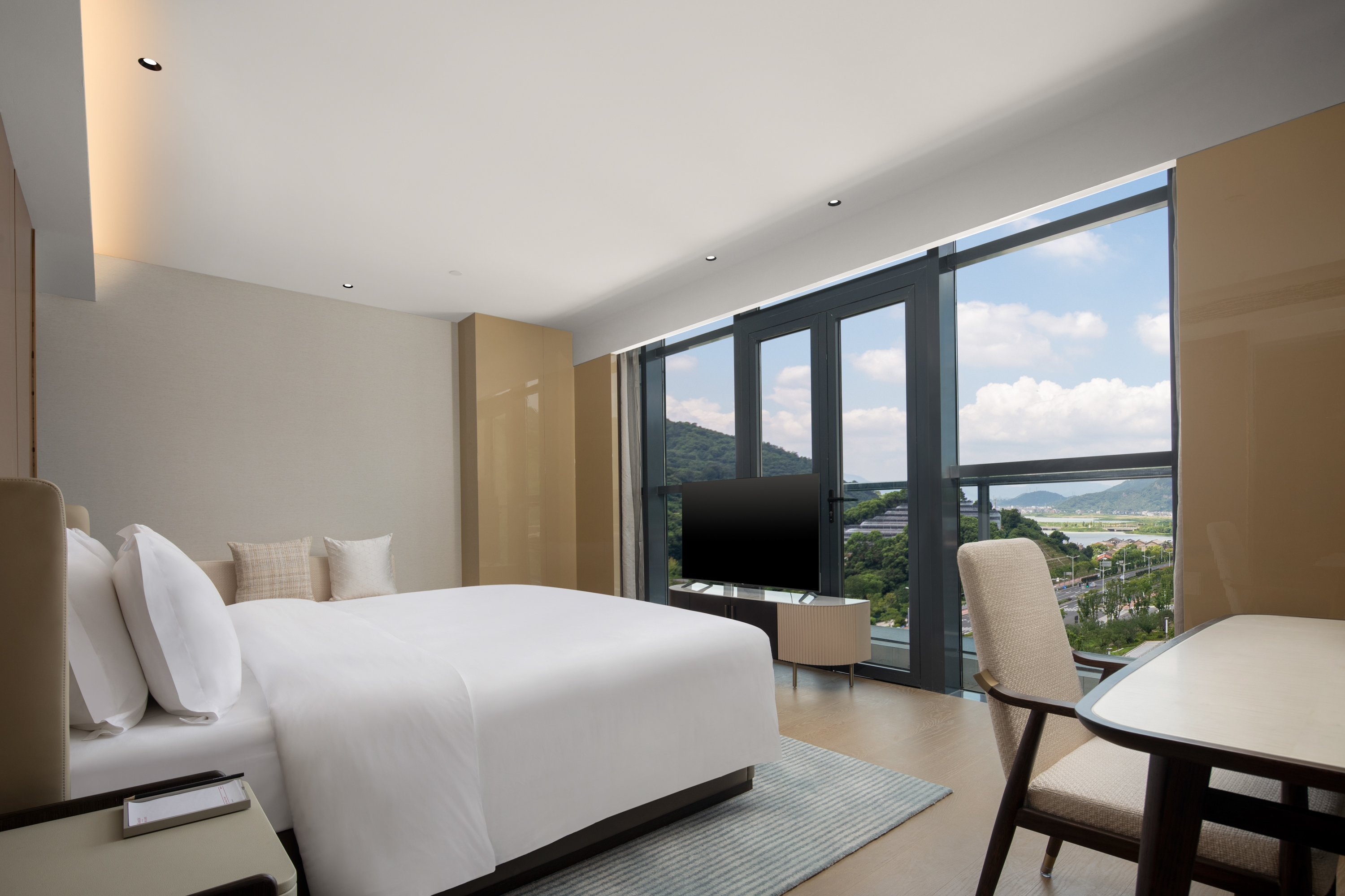 Guest room at the Ramada by Wyndham Taizhou West in Taizhou, Other than US/Canada