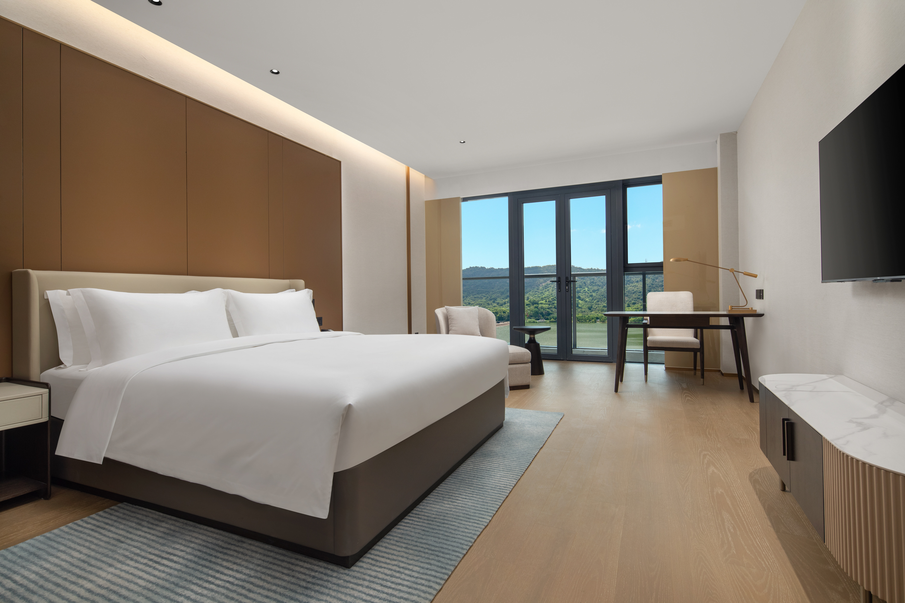 Guest room at the Ramada by Wyndham Taizhou West in Taizhou, Other than US/Canada