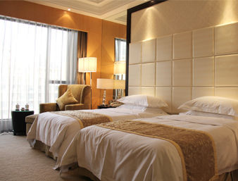 Guest room at the Ramada Plaza by Wyndham Weifang in Weifang, Other than US/Canada