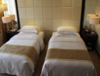 Guest room at the Ramada Plaza by Wyndham Weifang in Weifang, Other than US/Canada