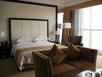 Guest room at the Ramada Plaza by Wyndham Weifang in Weifang, Other than US/Canada