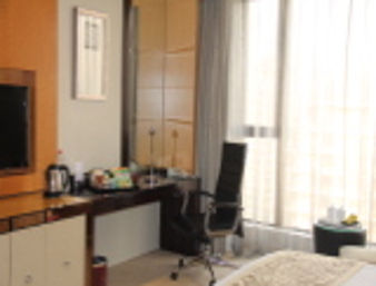 Guest room at the Ramada Plaza by Wyndham Weifang in Weifang, Other than US/Canada