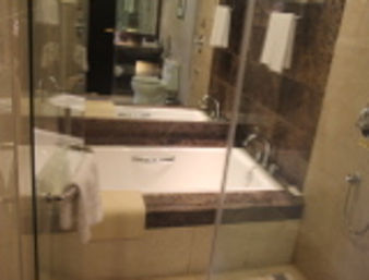 Guest room at the Ramada Plaza by Wyndham Weifang in Weifang, Other than US/Canada